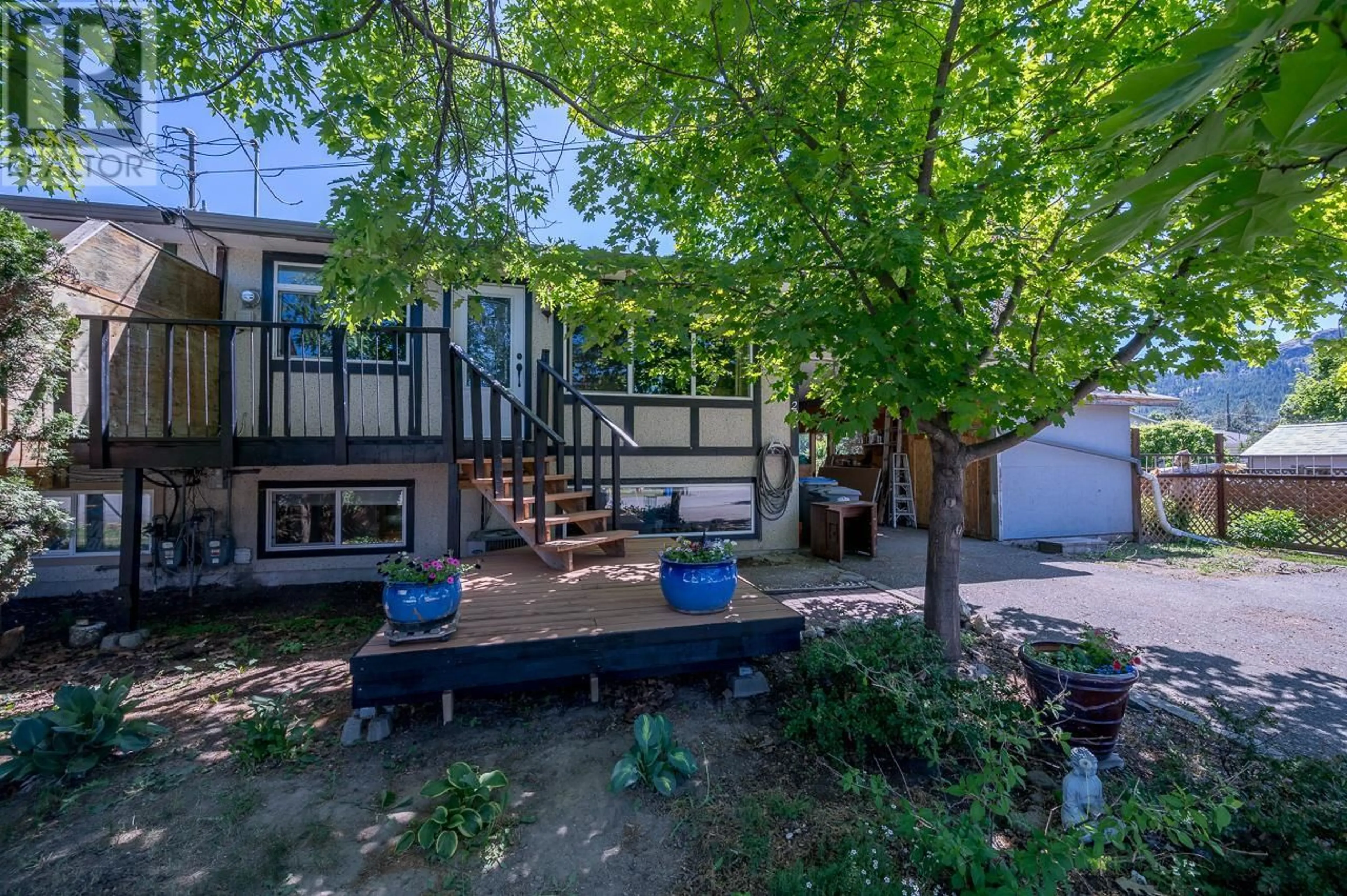 A pic from exterior of the house or condo, the fenced backyard for 287 REIGHMOUNT Drive, Kamloops British Columbia V2H1T7