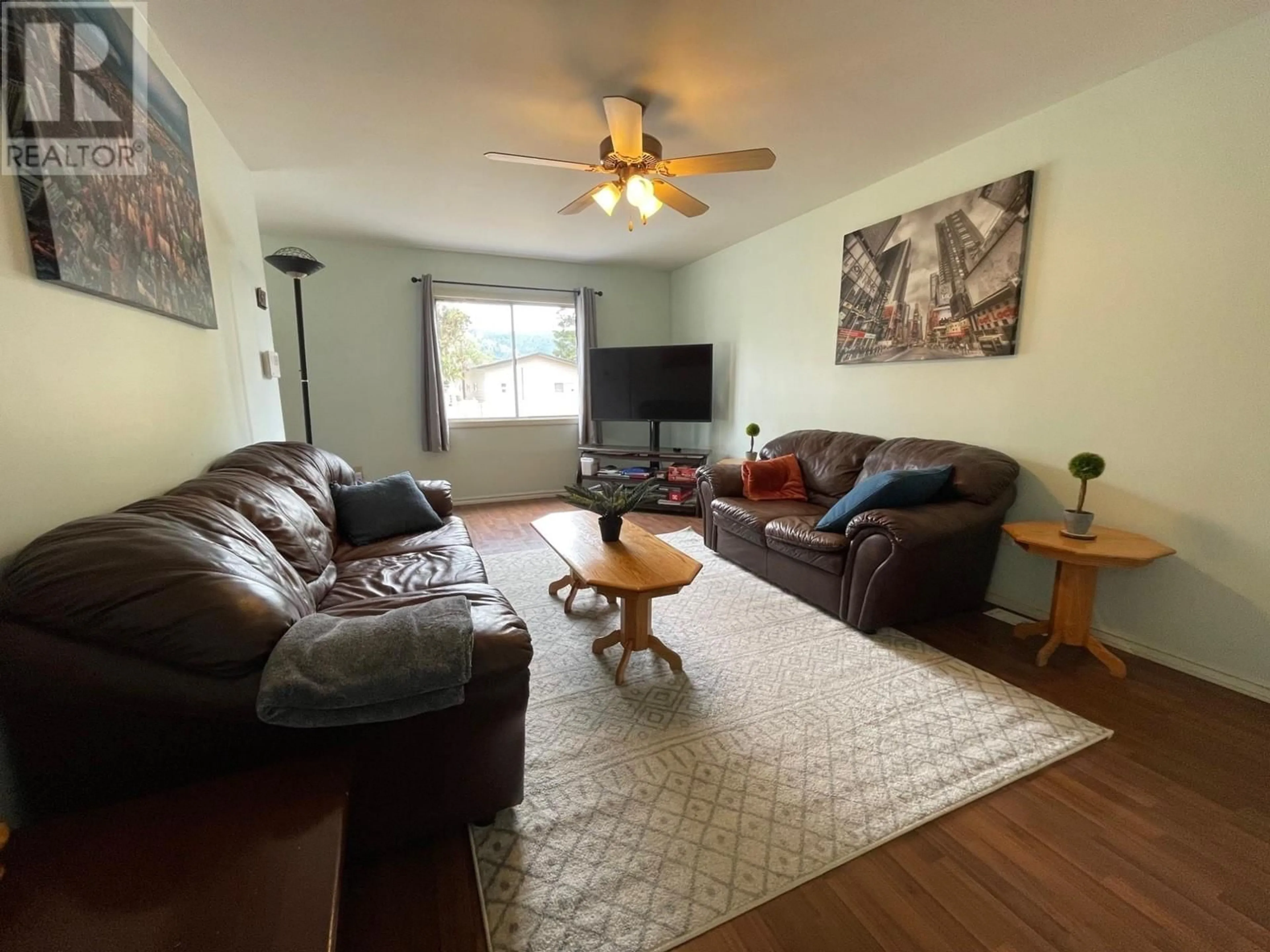 Living room, wood floors for 1309 FIR Avenue, Merritt British Columbia V1K1L1