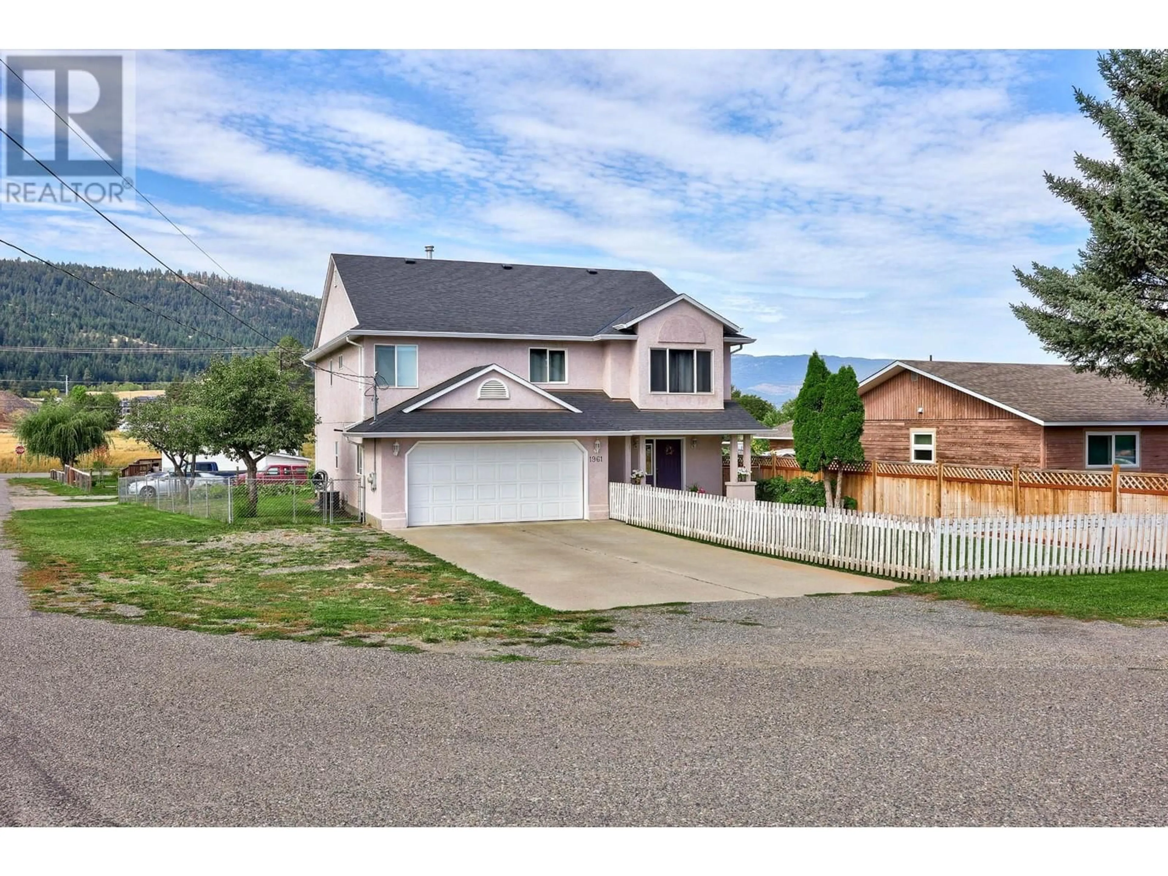 Frontside or backside of a home for 1961 MORRISSEY STREET, Merritt British Columbia V1K1L5