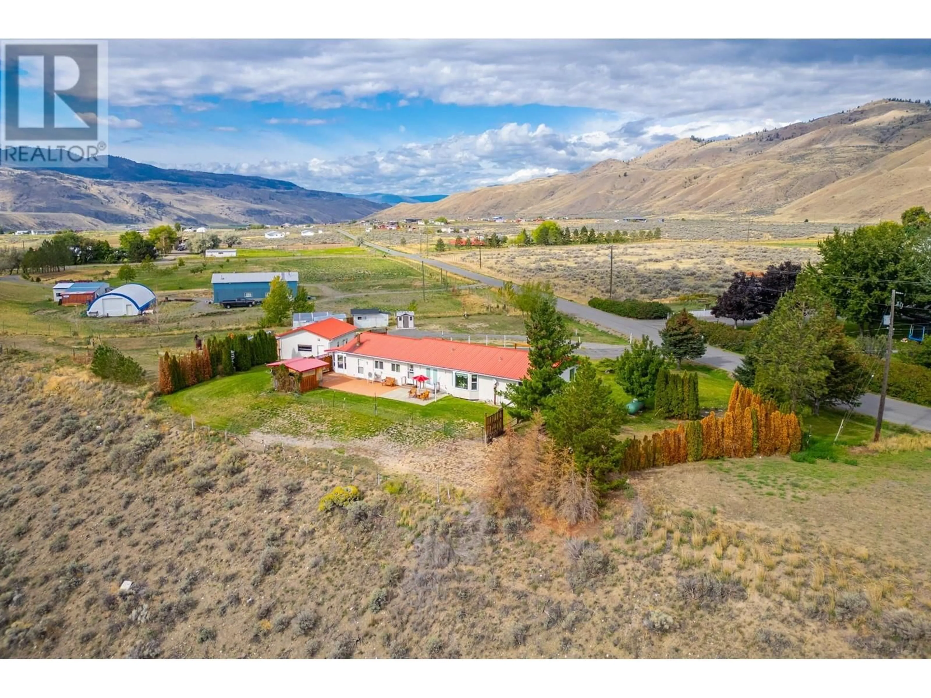 A pic from exterior of the house or condo, the fenced backyard for 6712 PINECREST Drive, Kamloops British Columbia V0K2J0