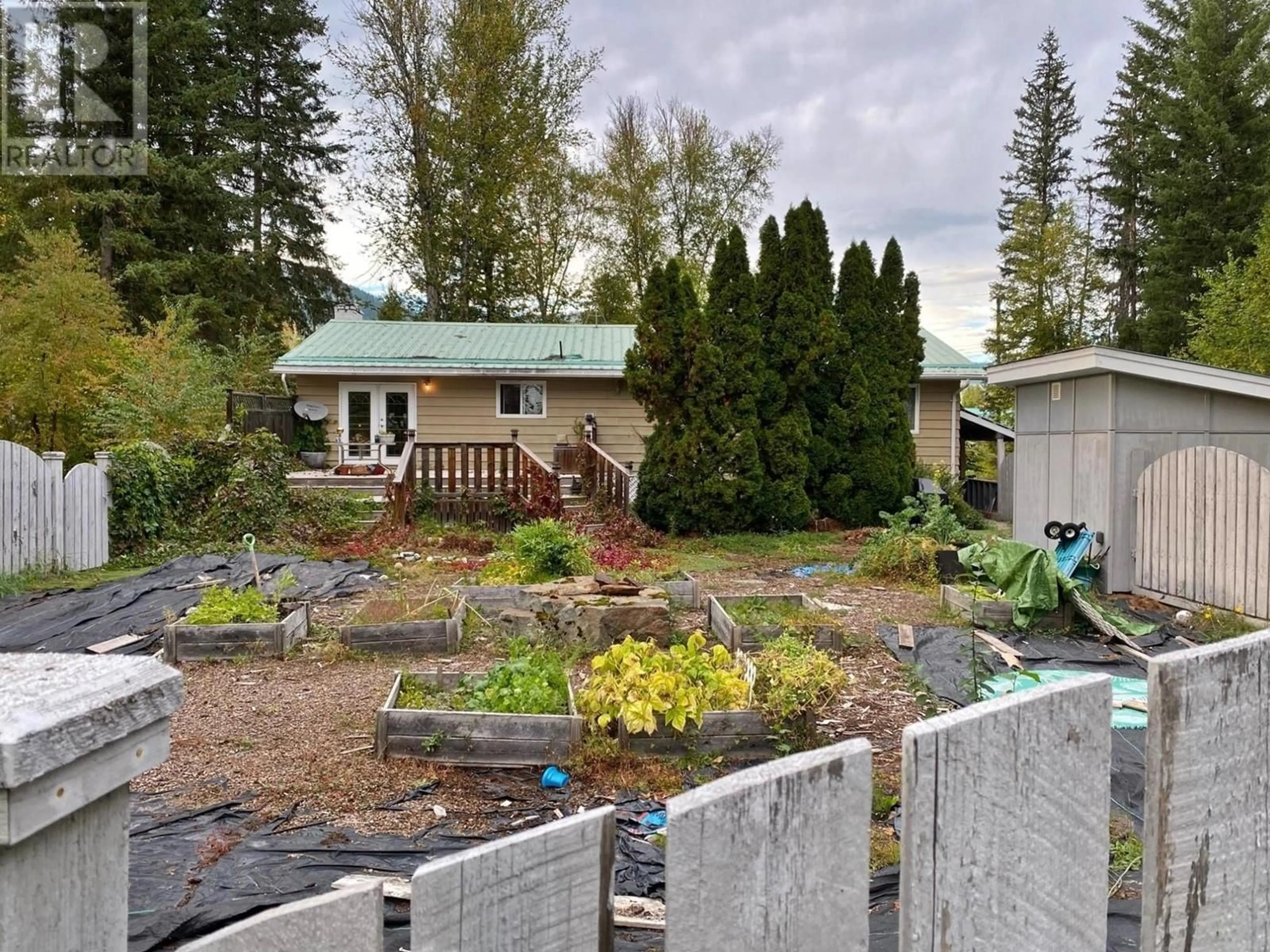 Frontside or backside of a home, the fenced backyard for 324 DUNLEVY Road, Clearwater British Columbia V0E1N2