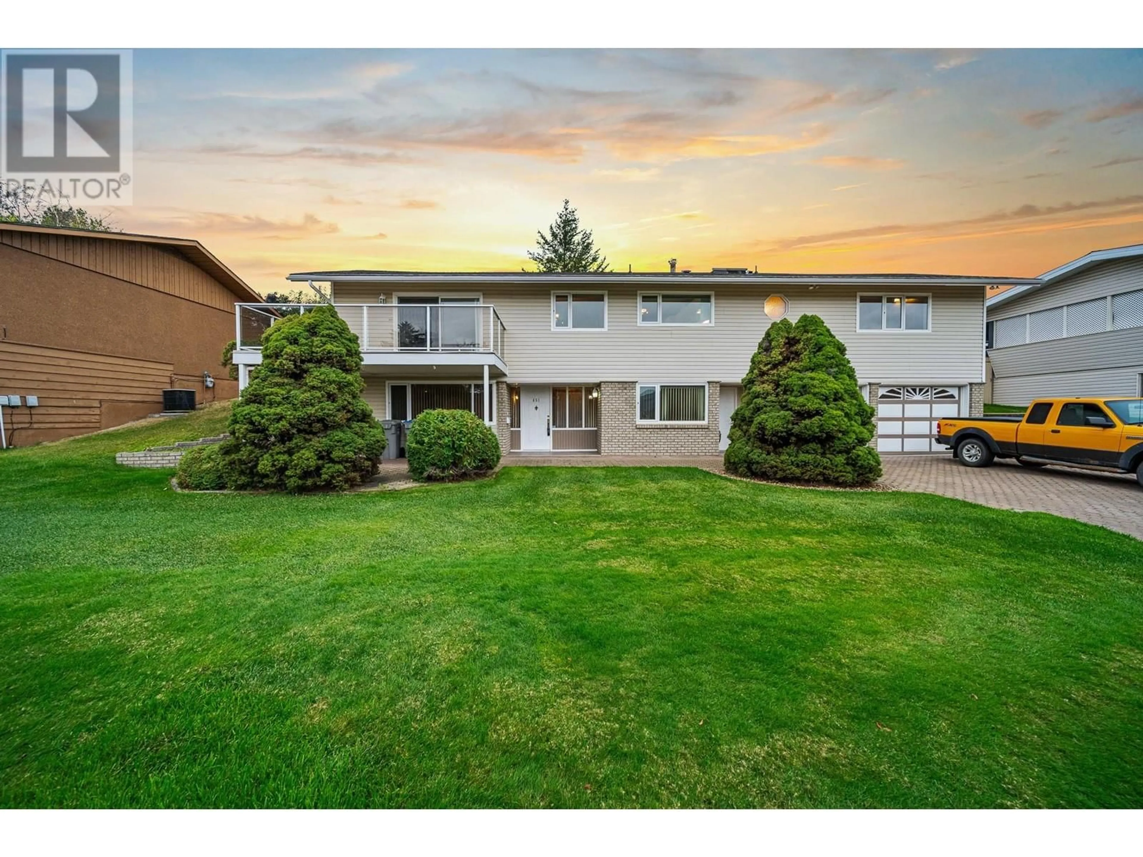 A pic from exterior of the house or condo, the fenced backyard for 451 GREENSTONE Drive, Kamloops British Columbia V2C1N8