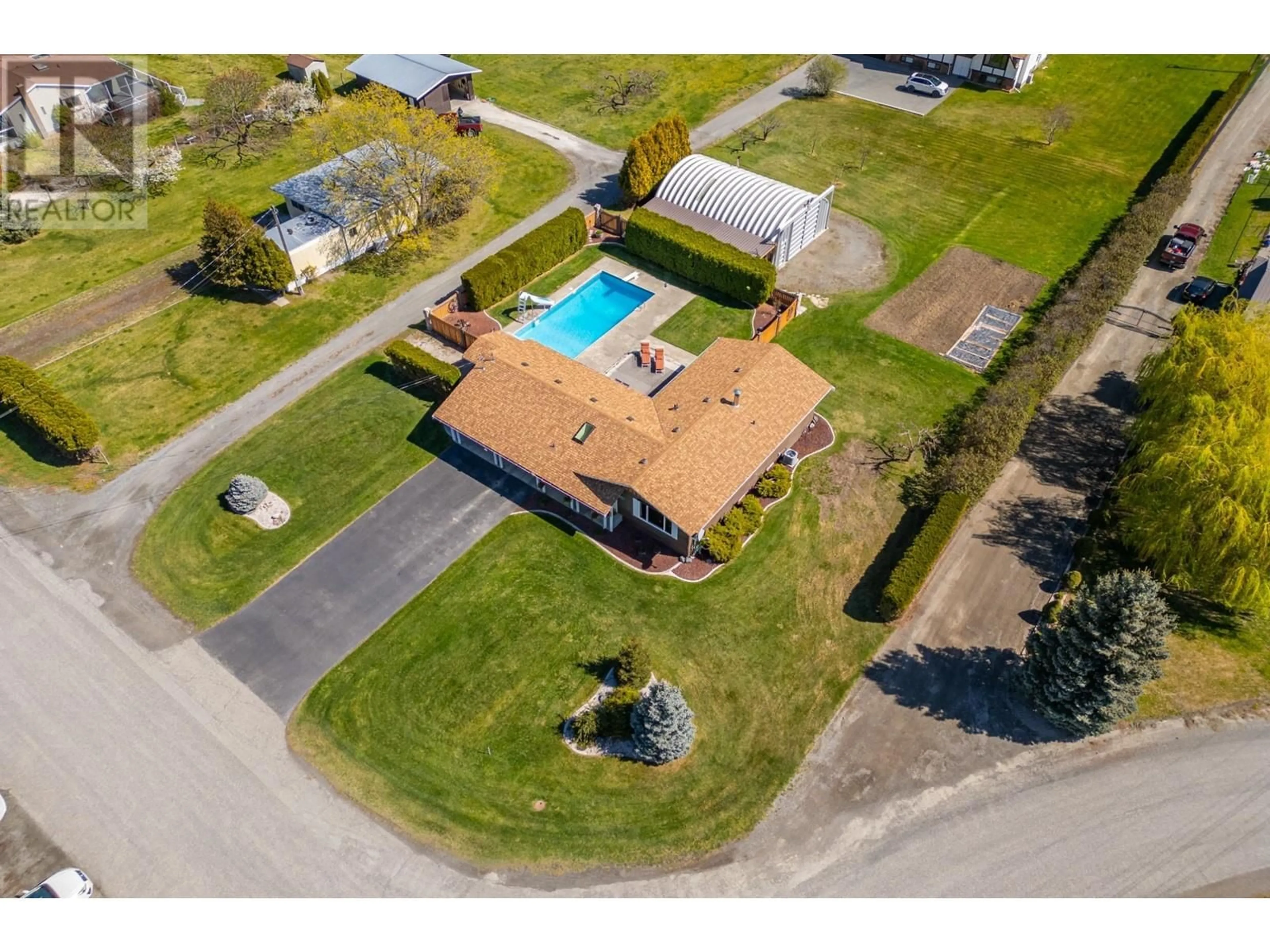 Frontside or backside of a home, the fenced backyard for 194 DESTE Road, Lillooet British Columbia V0K1P0