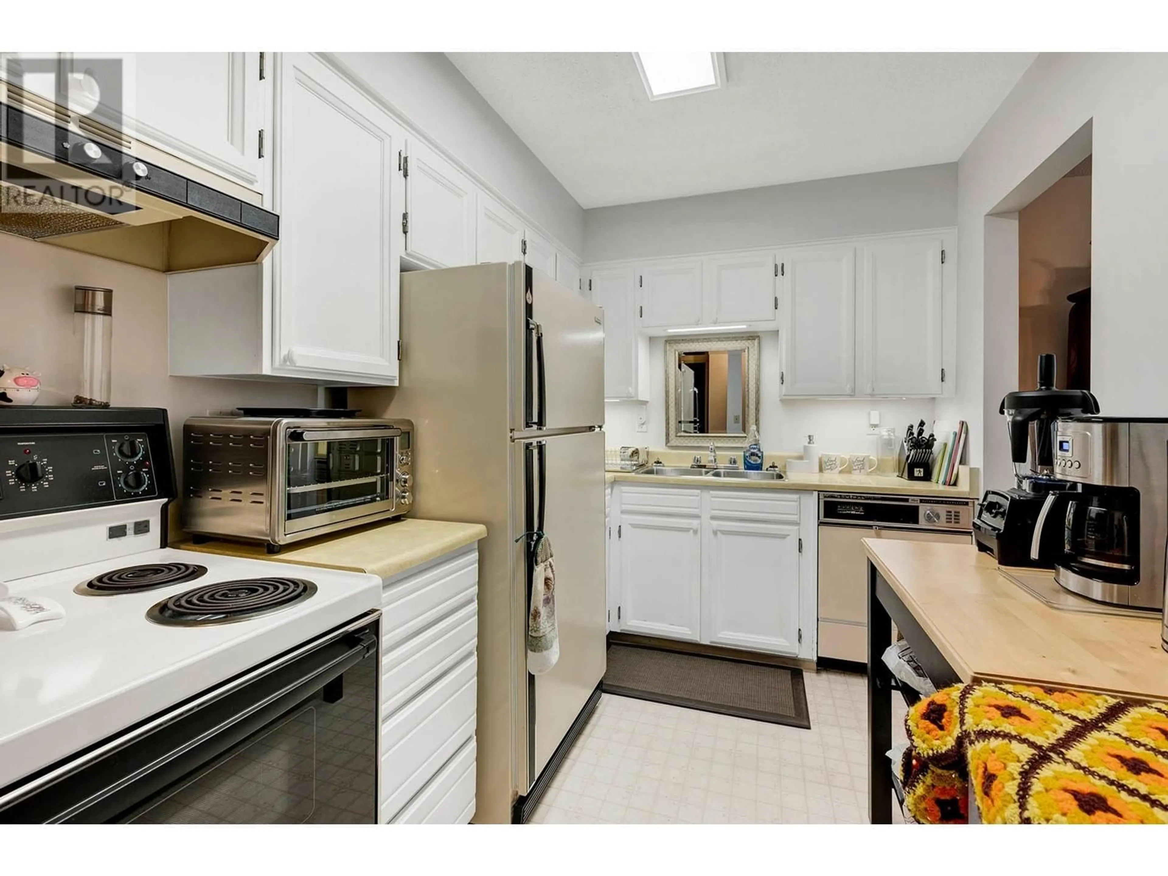 Standard kitchen, wood floors for 411 NICOLA Street Unit# 207, Kamloops British Columbia V2C2P7