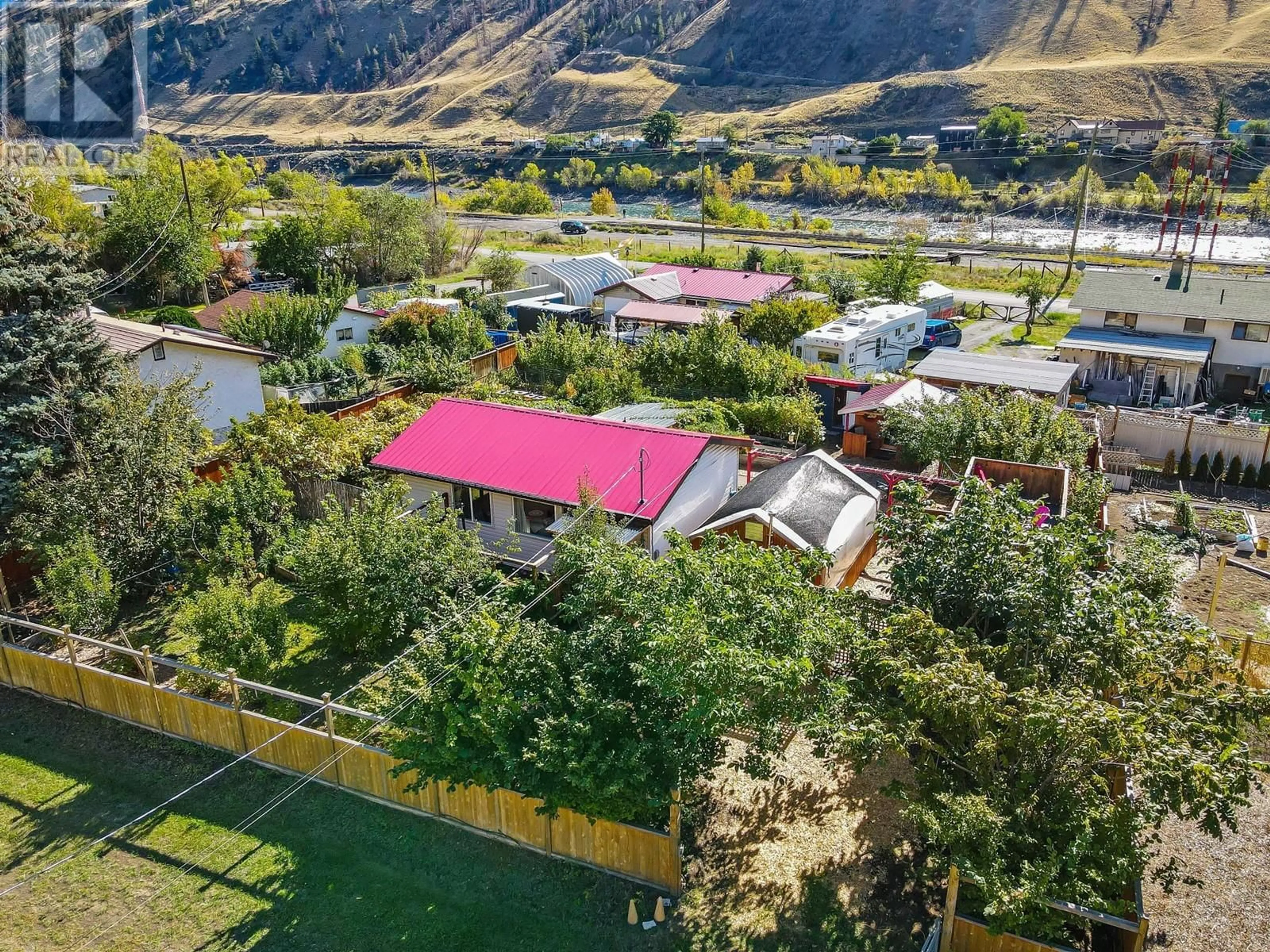 A pic from exterior of the house or condo, the fenced backyard for 3616 BIG HORN CURL, Ashcroft British Columbia V0K2L0