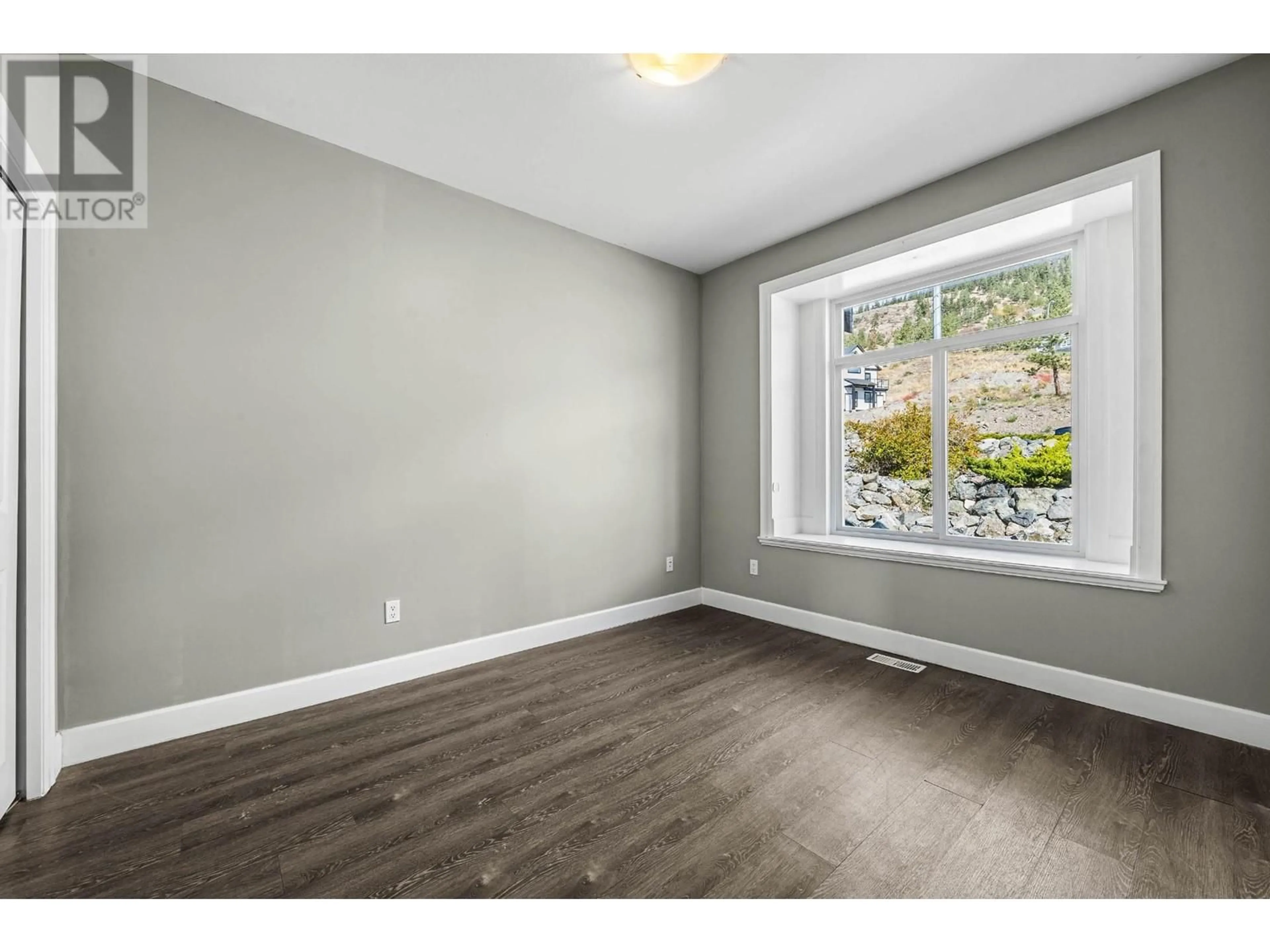 A pic of a room, wood floors for 2748 EAGLE Crescent, Merritt British Columbia V1K0B3