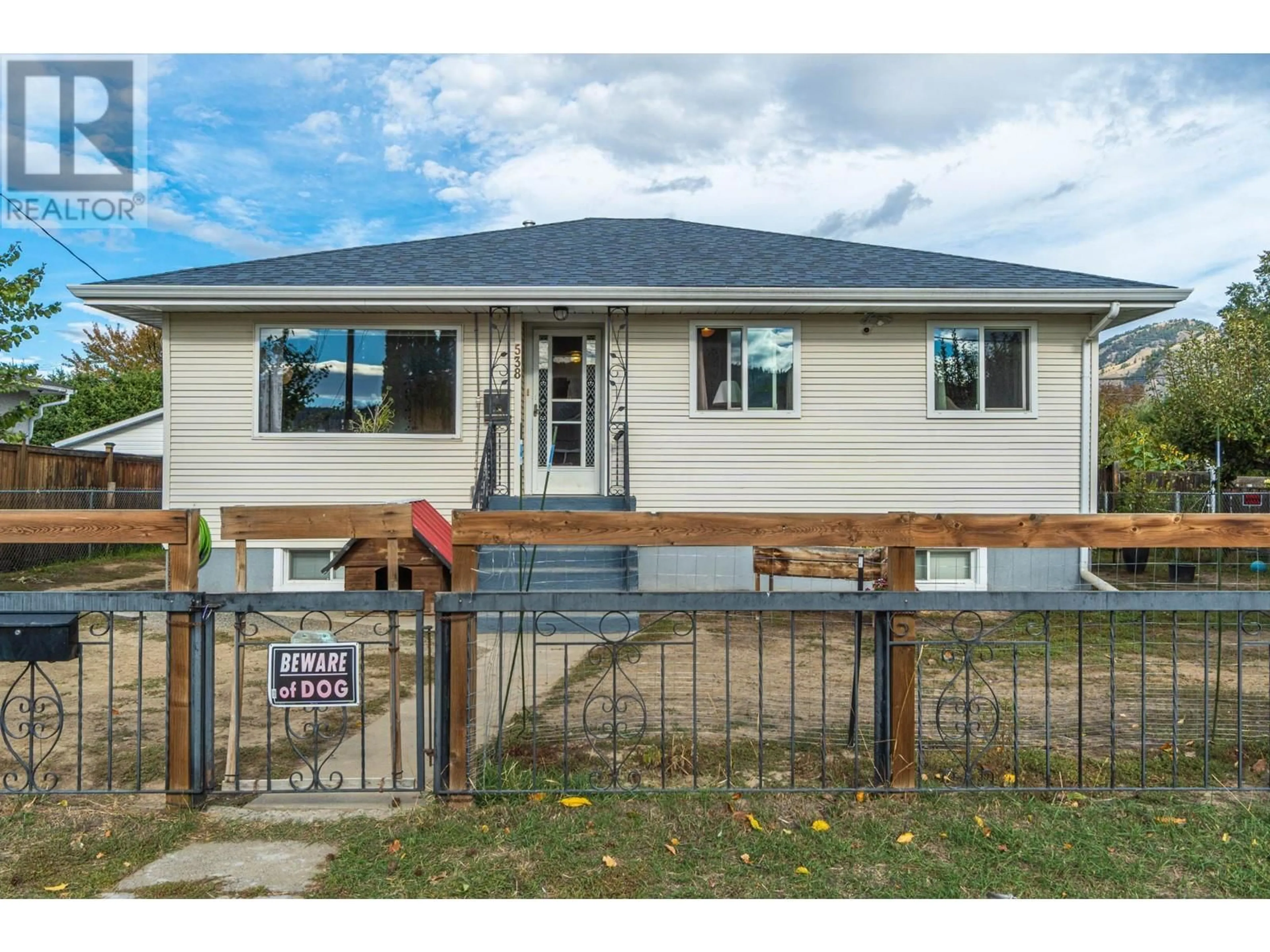 Frontside or backside of a home, the fenced backyard for 538 LINDEN Avenue, Kamloops British Columbia V2B2N6