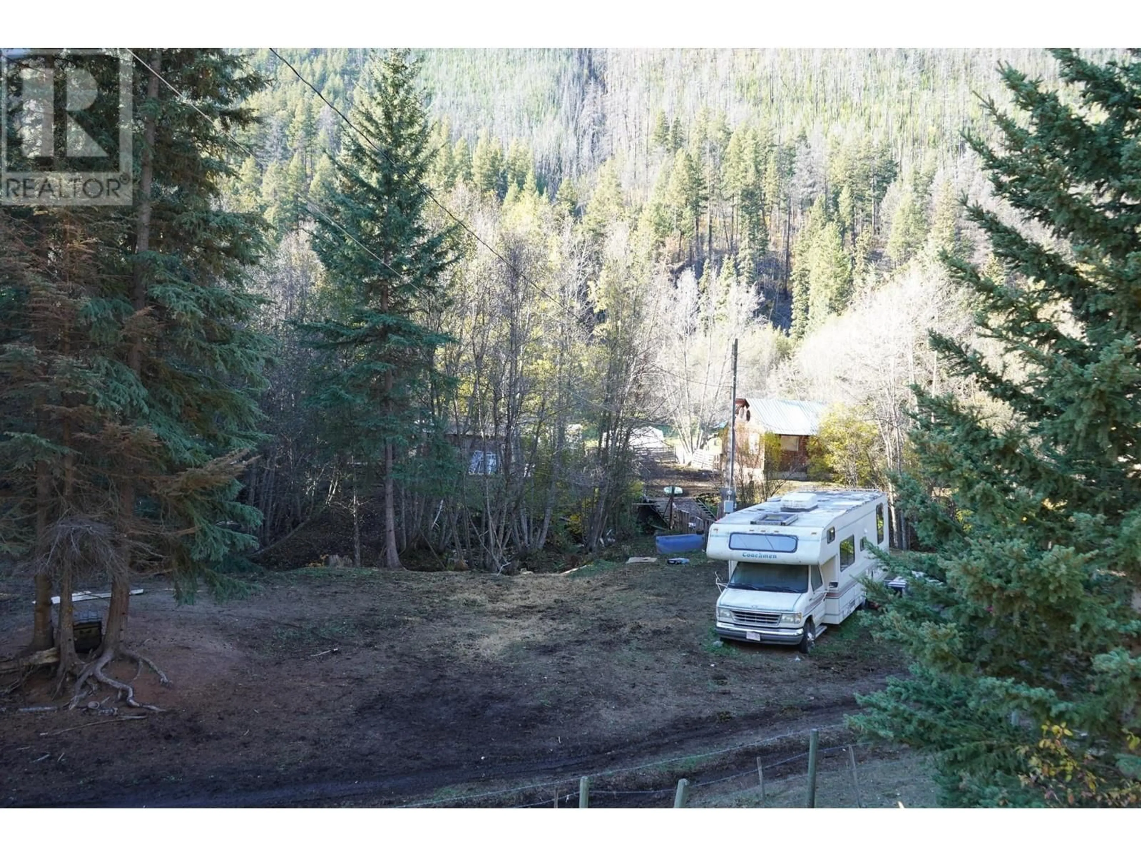 A pic from outside/outdoor area/front of a property/back of a property/a pic from drone, forest/trees view for 6881 JESMOND ROAD, Clinton British Columbia V0K1K0