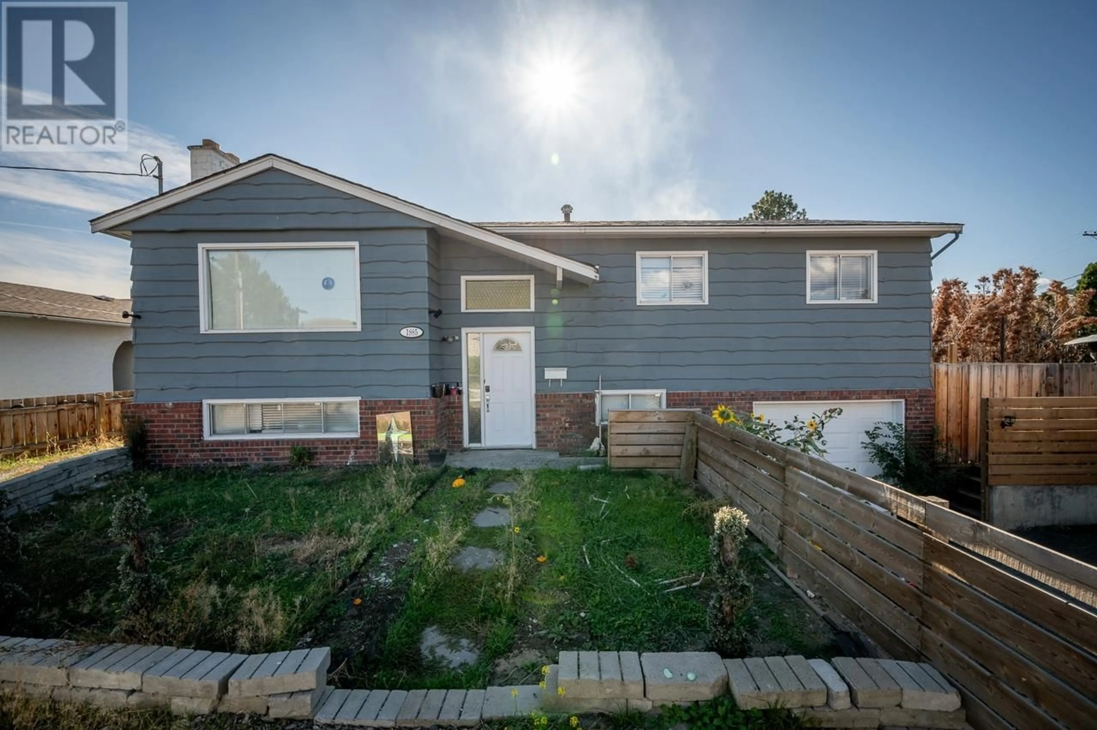 Frontside or backside of a home, the fenced backyard for 1885 TRANQUILLE Road, Kamloops British Columbia V2B3M3