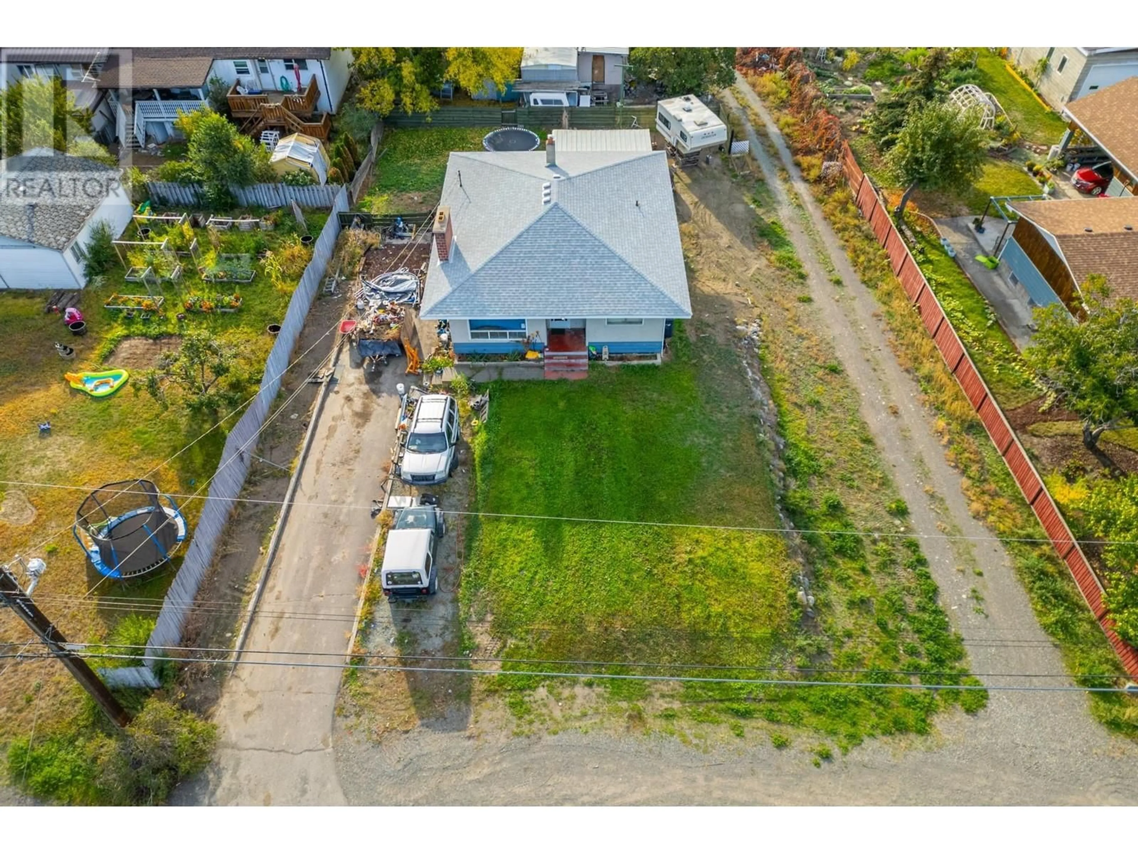 Frontside or backside of a home, the fenced backyard for 281 TINGLEY Street, Ashcroft British Columbia V0K1A0