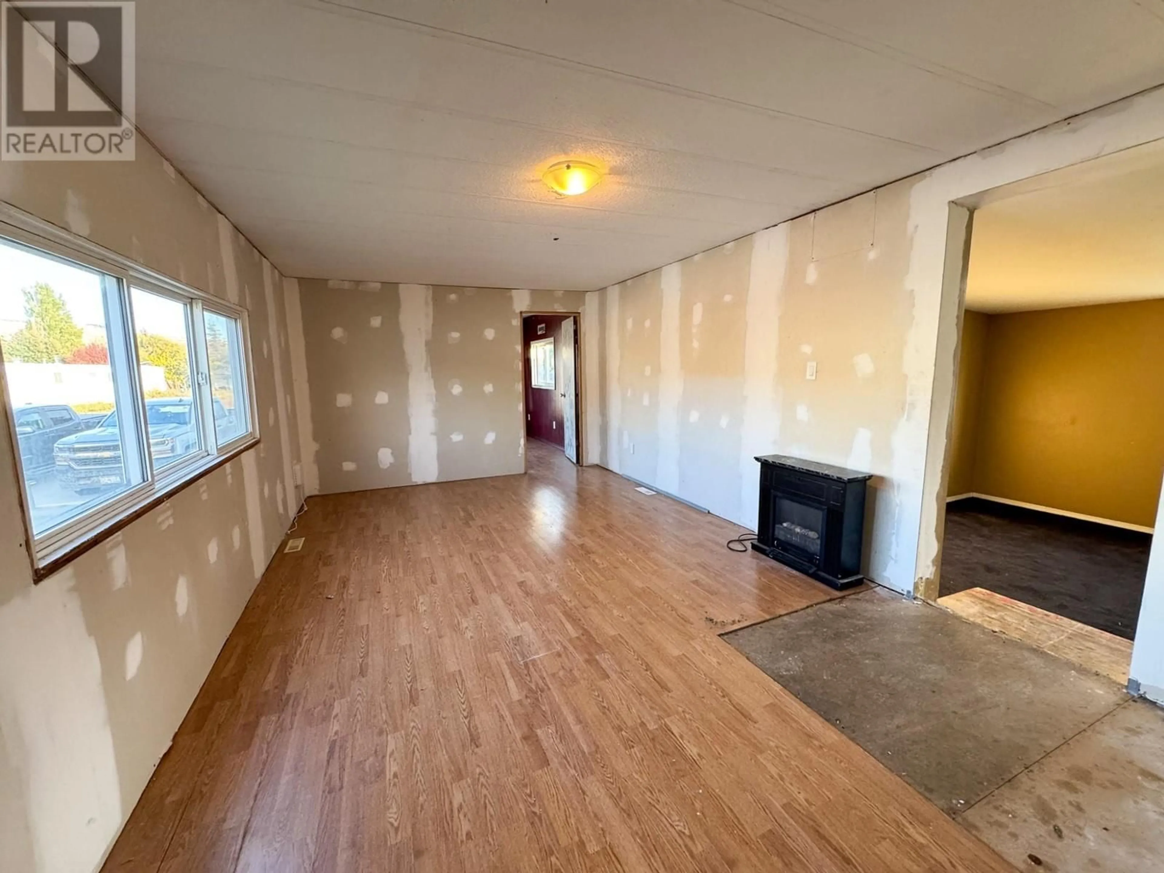 A pic of a room, wood floors for 2776 CLAPPERTON Avenue Unit# 30, Merritt British Columbia V1K1G5