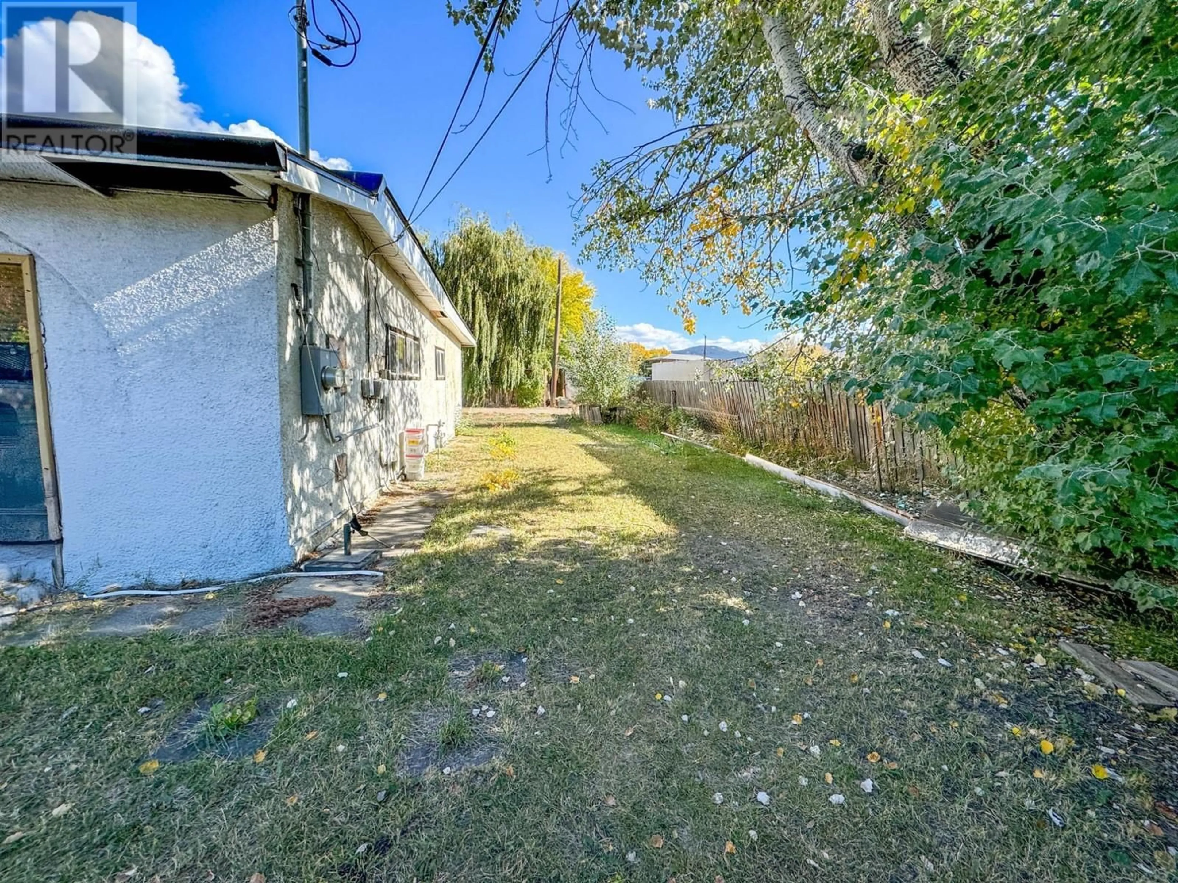 Patio, the fenced backyard for 1730 HILL Street, Merritt British Columbia V1K1B8