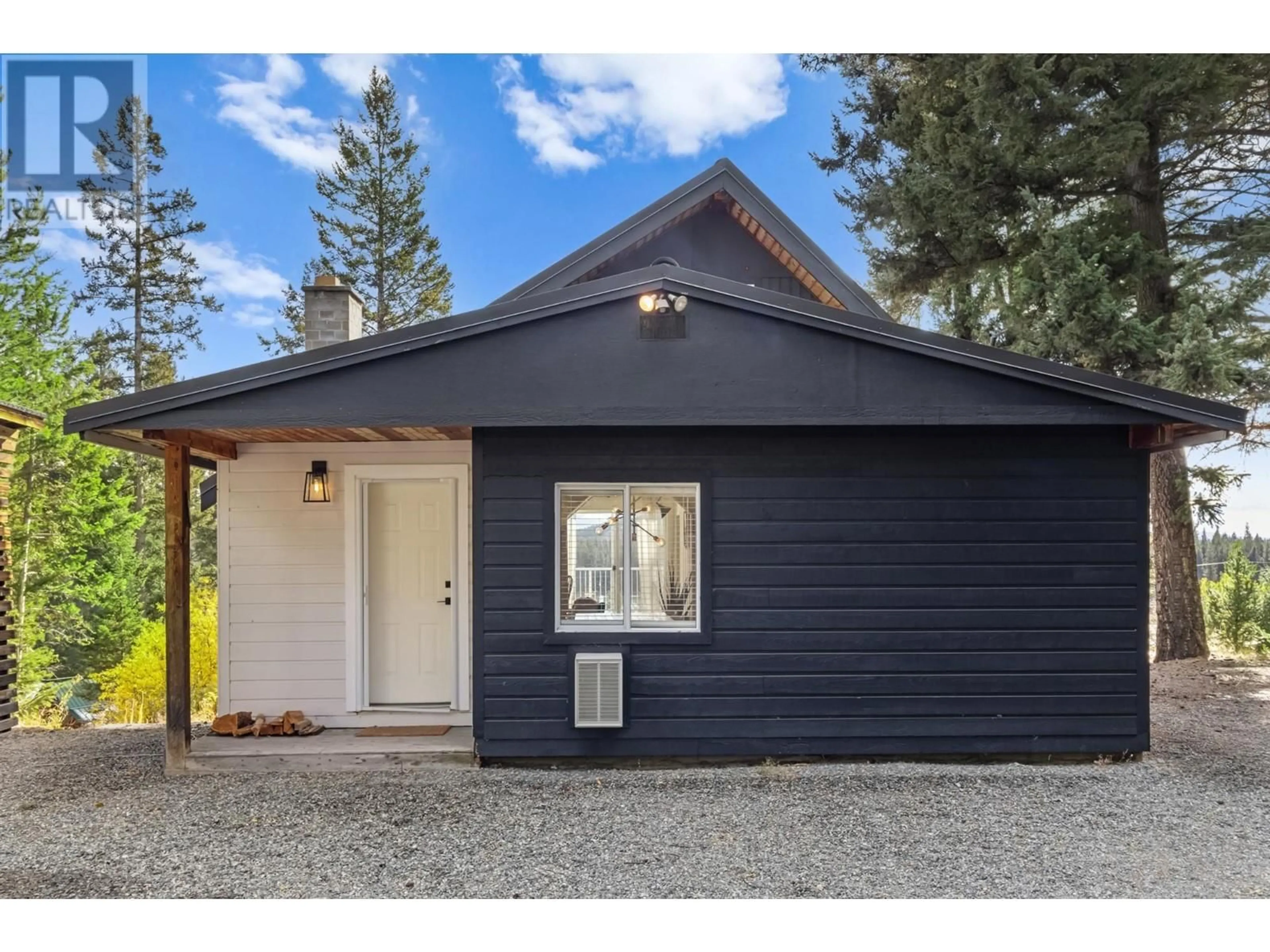 Home with vinyl exterior material, street for 5033 LAUDER ROAD, Merritt British Columbia V1K1M8