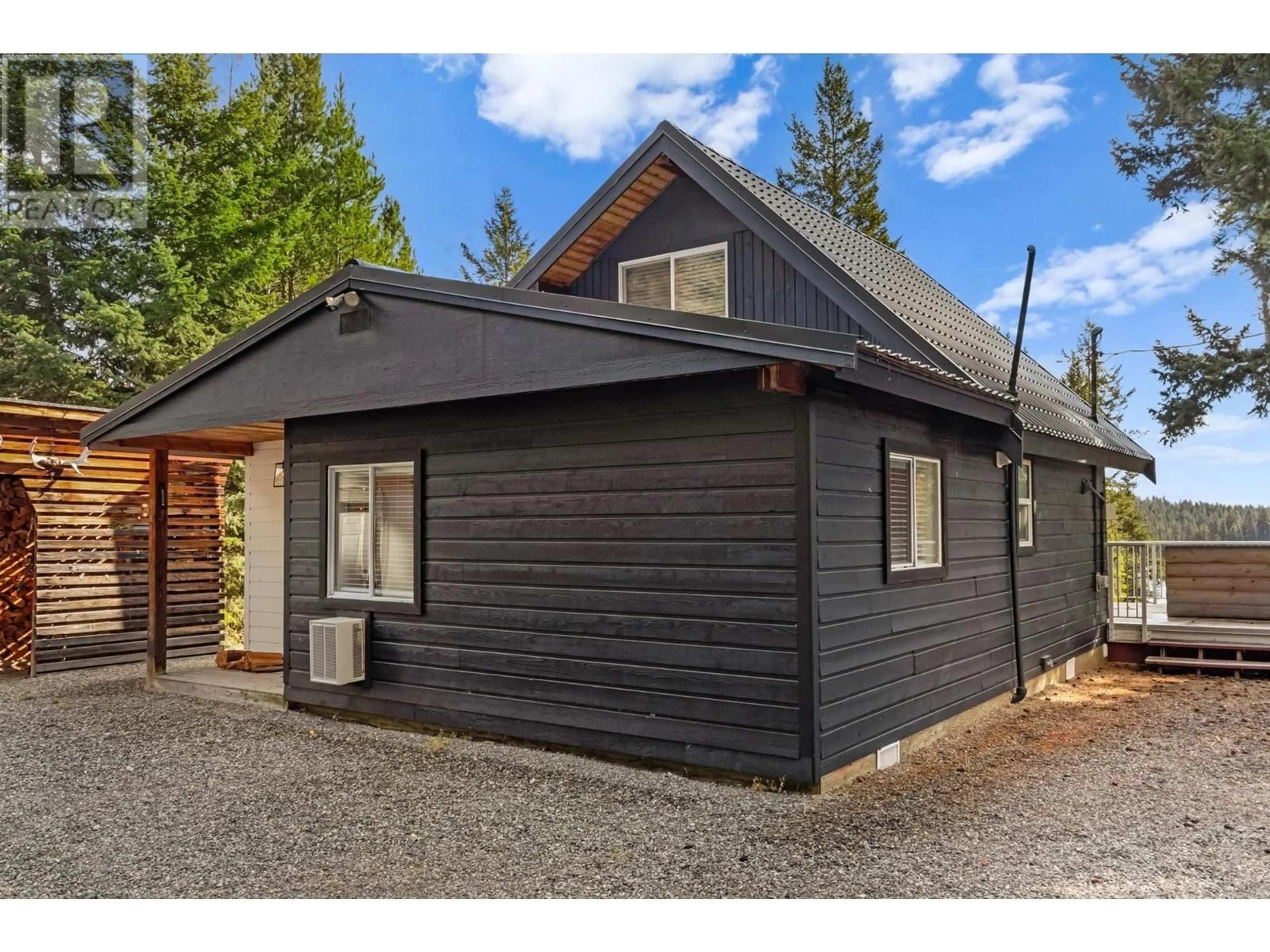 Home with vinyl exterior material, street for 5033 LAUDER ROAD, Merritt British Columbia V1K1M8