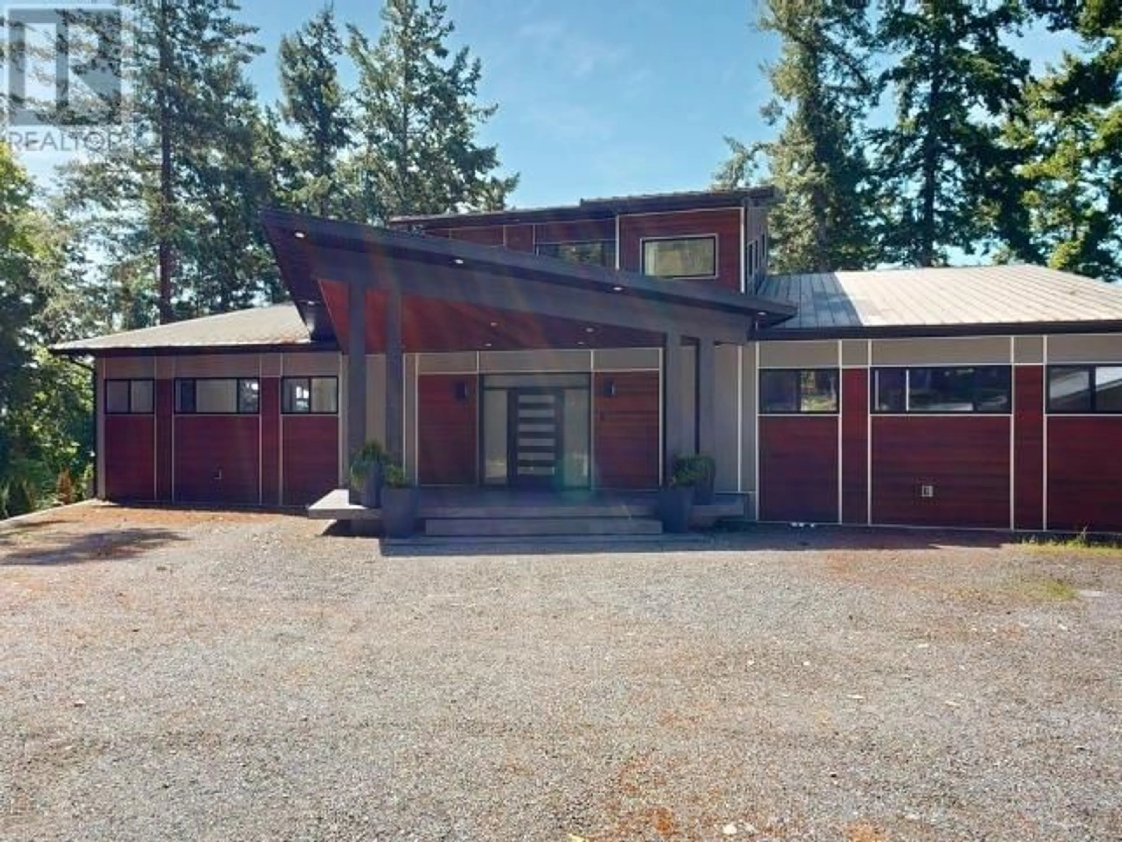 Frontside or backside of a home, the front or back of building for 7495 HIGHWAY 101, Powell River British Columbia V8A0R1