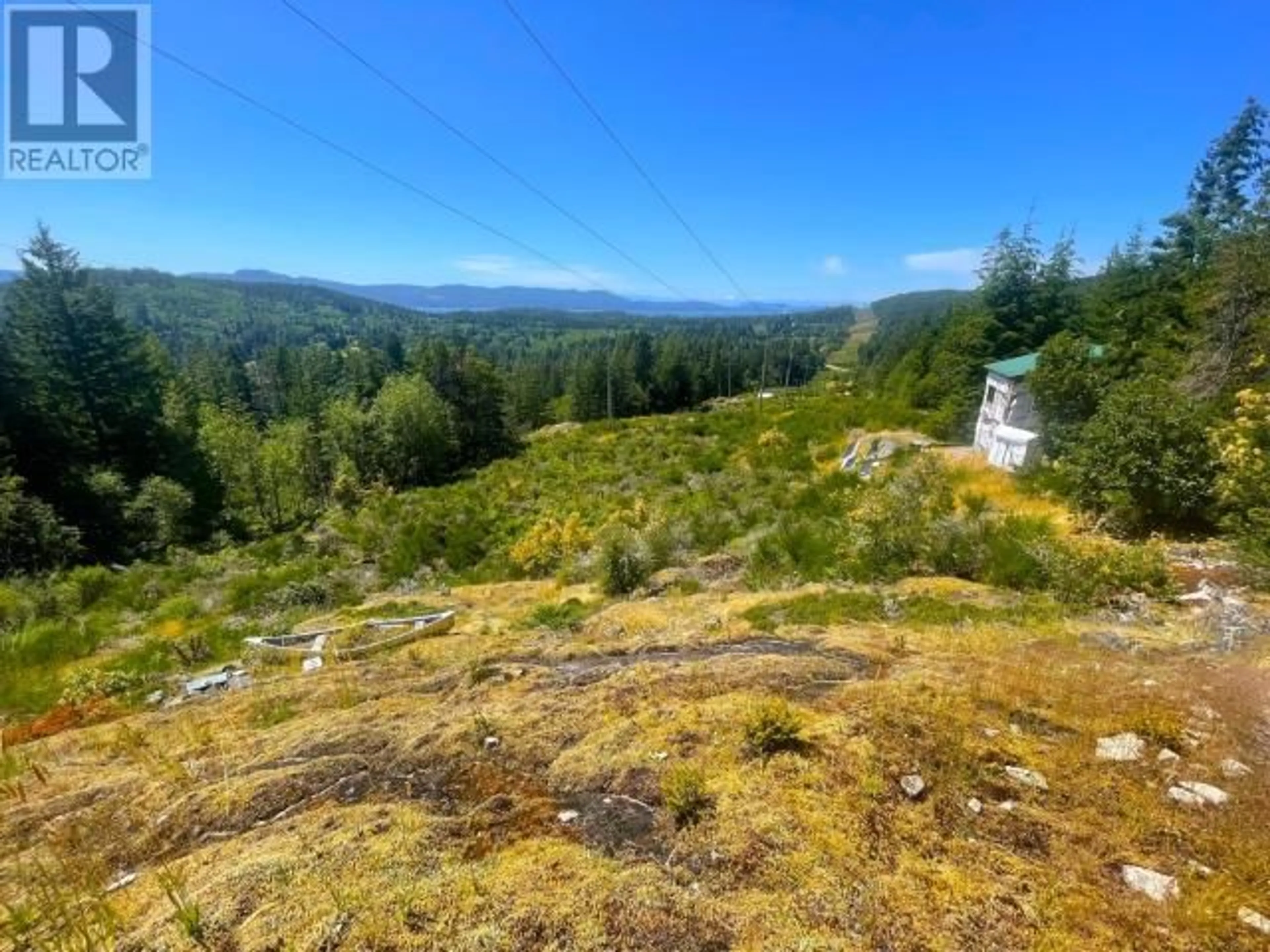 A pic from outside/outdoor area/front of a property/back of a property/a pic from drone, forest/trees view for 12760 HIGHWAY 101, Powell River British Columbia V8A0M9