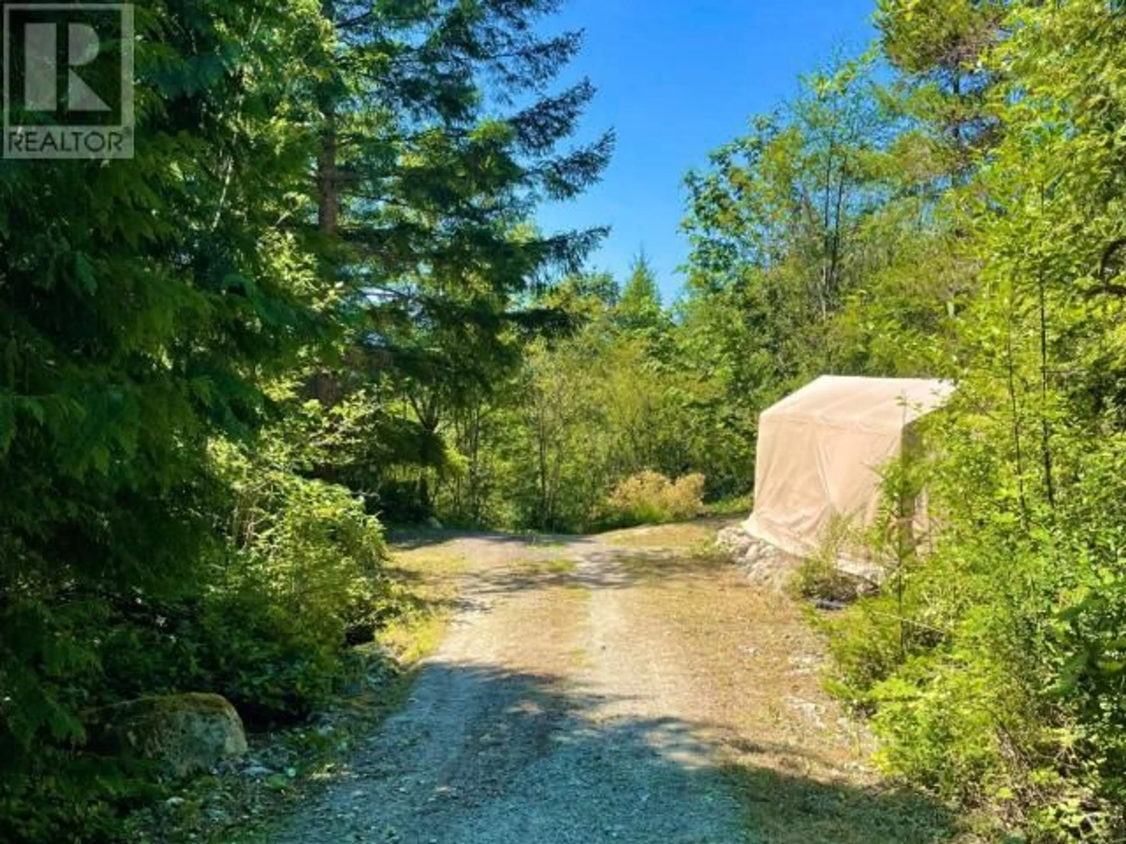 A pic from outside/outdoor area/front of a property/back of a property/a pic from drone, forest/trees view for 12760 HIGHWAY 101, Powell River British Columbia V8A0M9