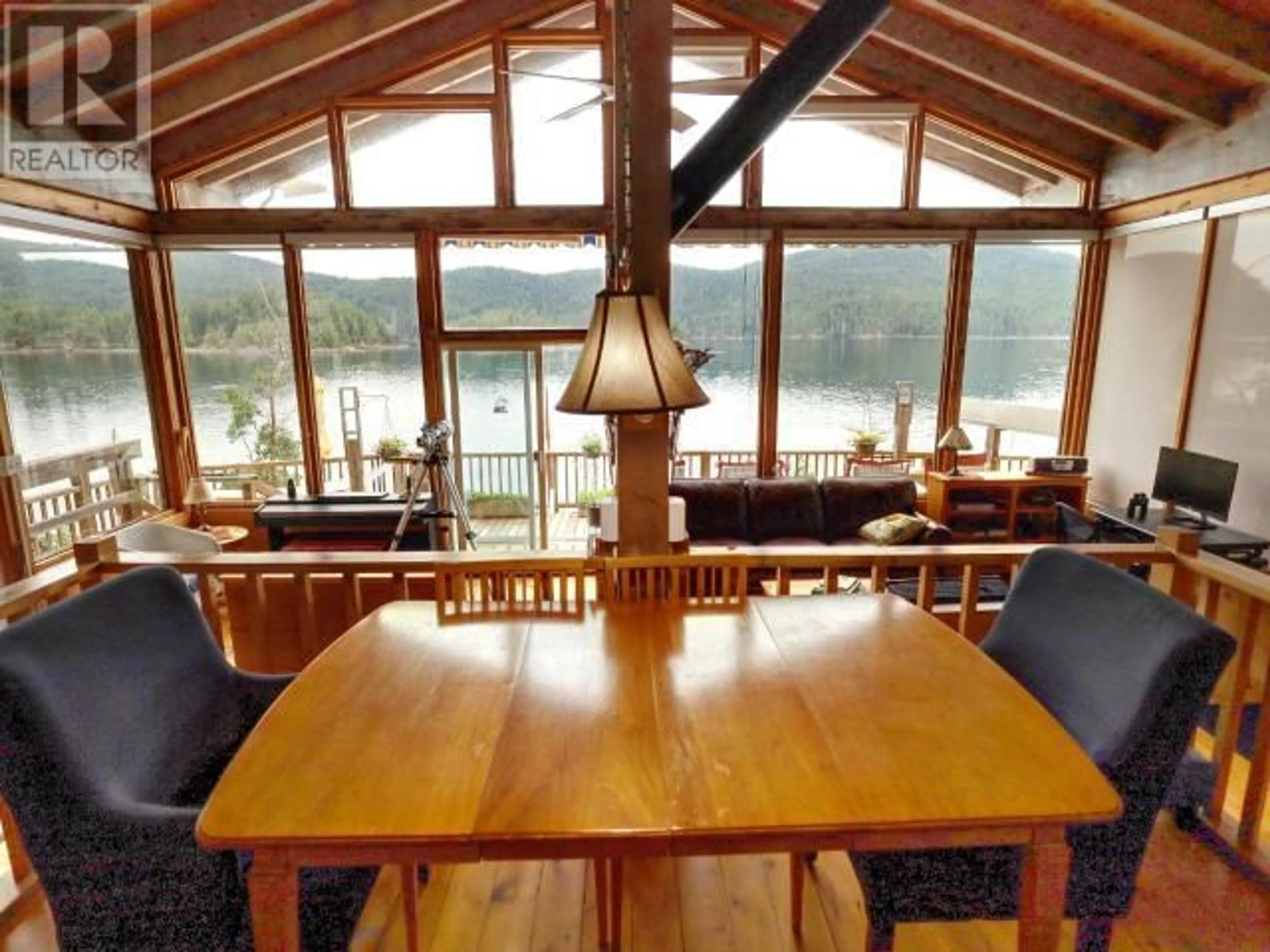 Dining room, wood floors, cottage for 11800 MALASPINA INLET, Remote Areas British Columbia V8A0G3