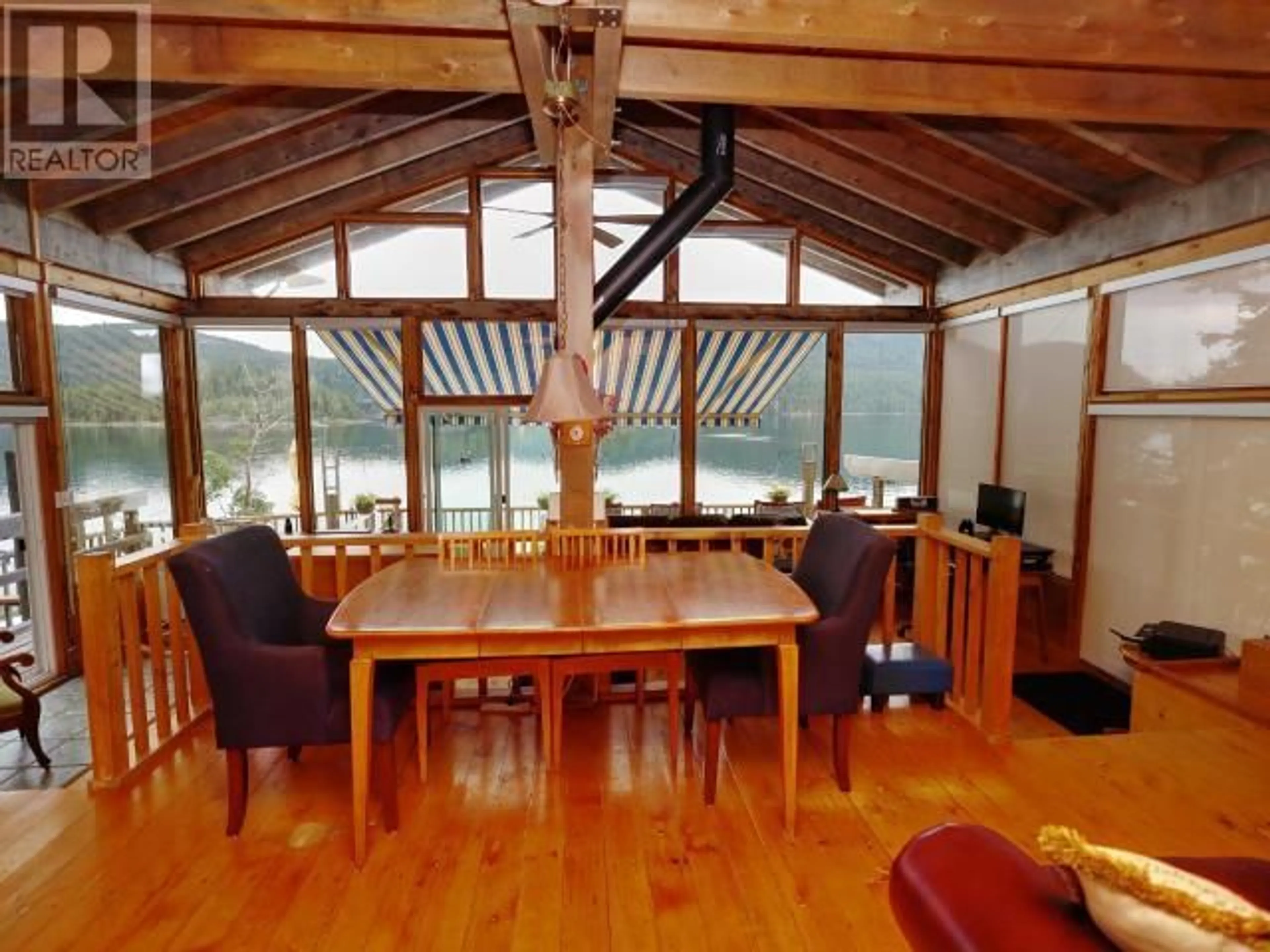 Dining room, wood floors, cottage for 11800 MALASPINA INLET, Remote Areas British Columbia V8A0G3