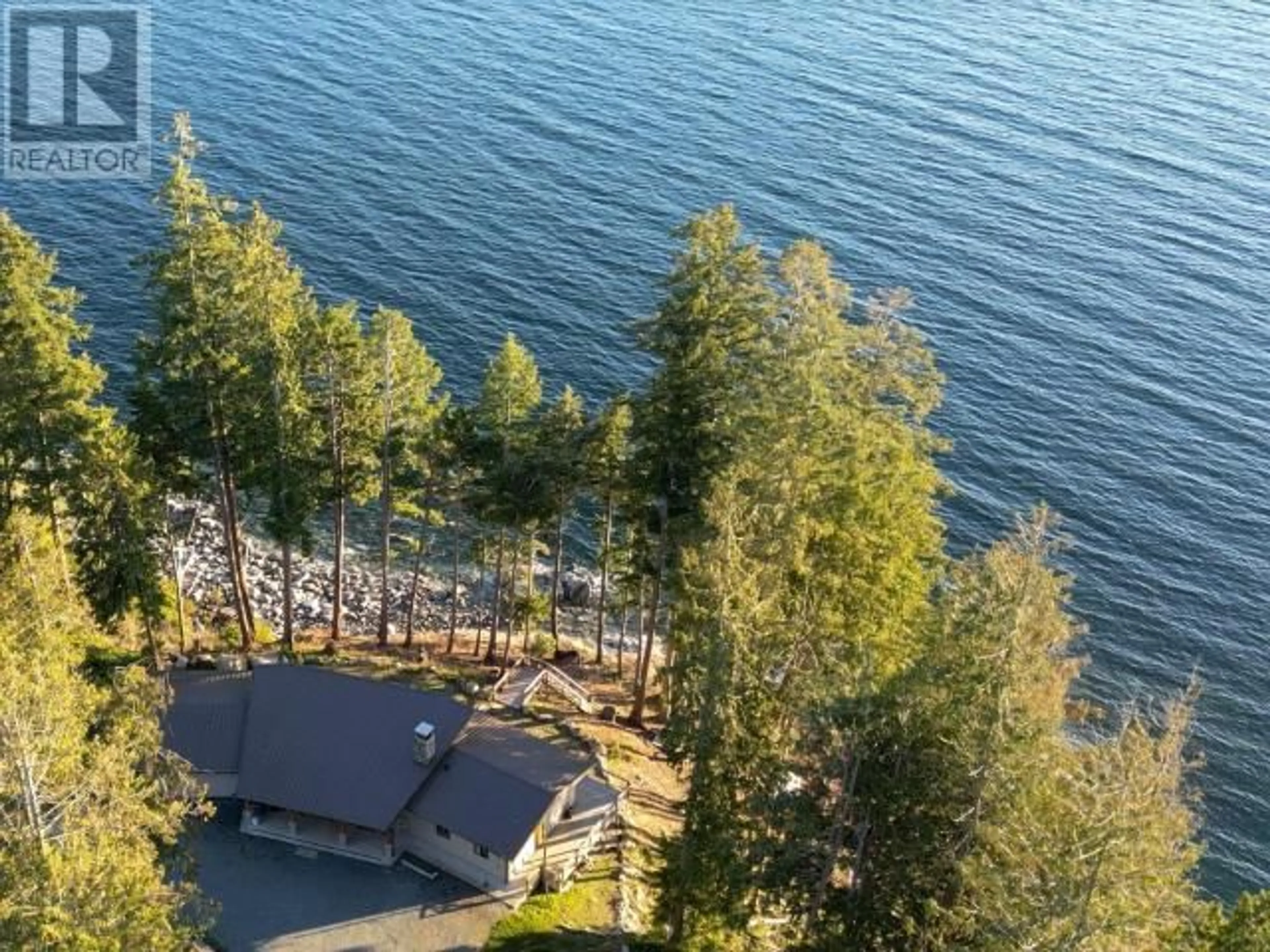 A pic from outside/outdoor area/front of a property/back of a property/a pic from drone, water/lake/river/ocean view for 12369 SCOTCH FIR POINT RD, Powell River British Columbia