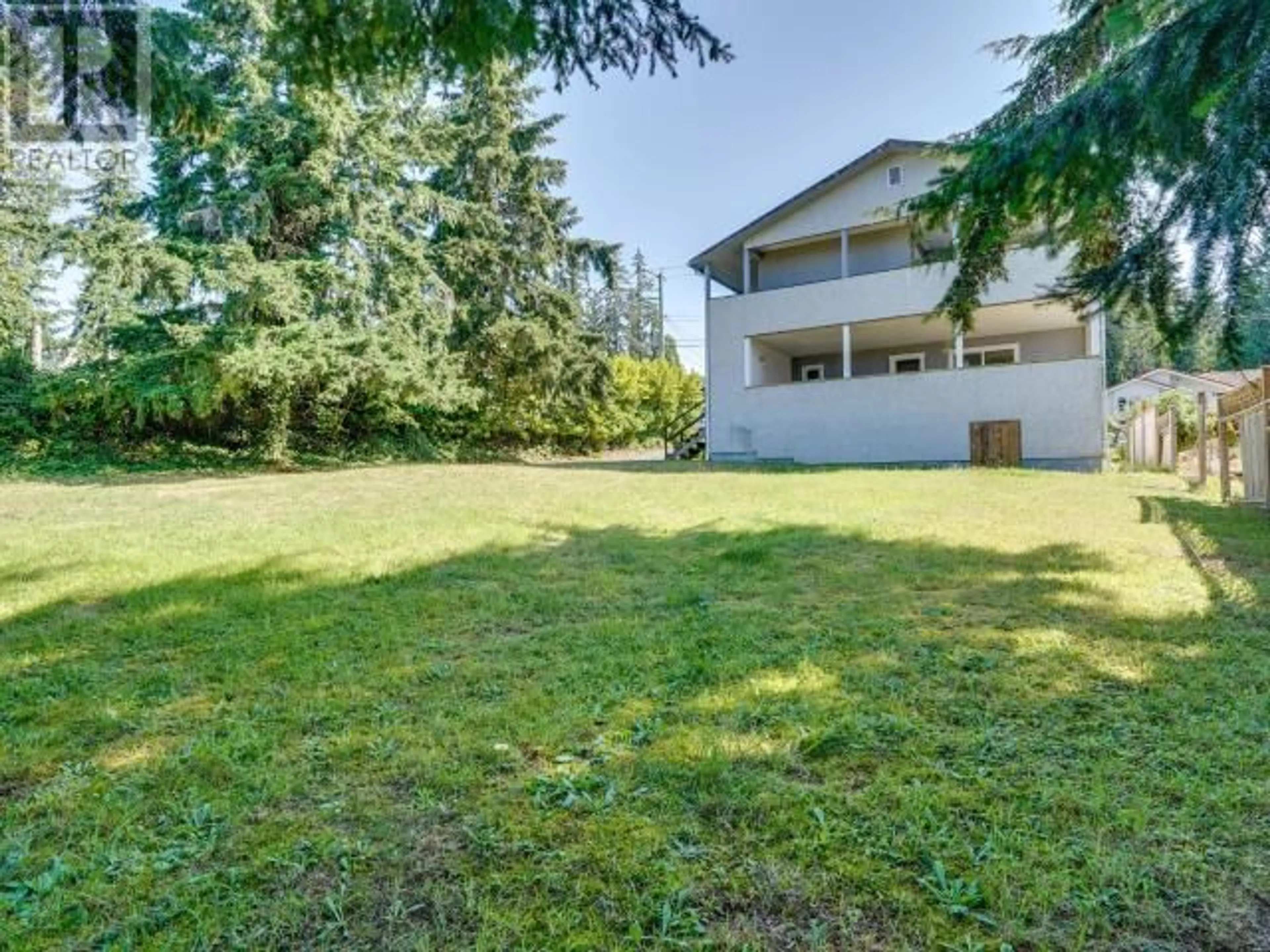 Frontside or backside of a home, the fenced backyard for 4763 FERNWOOD AVE, Powell River British Columbia V8A3L7