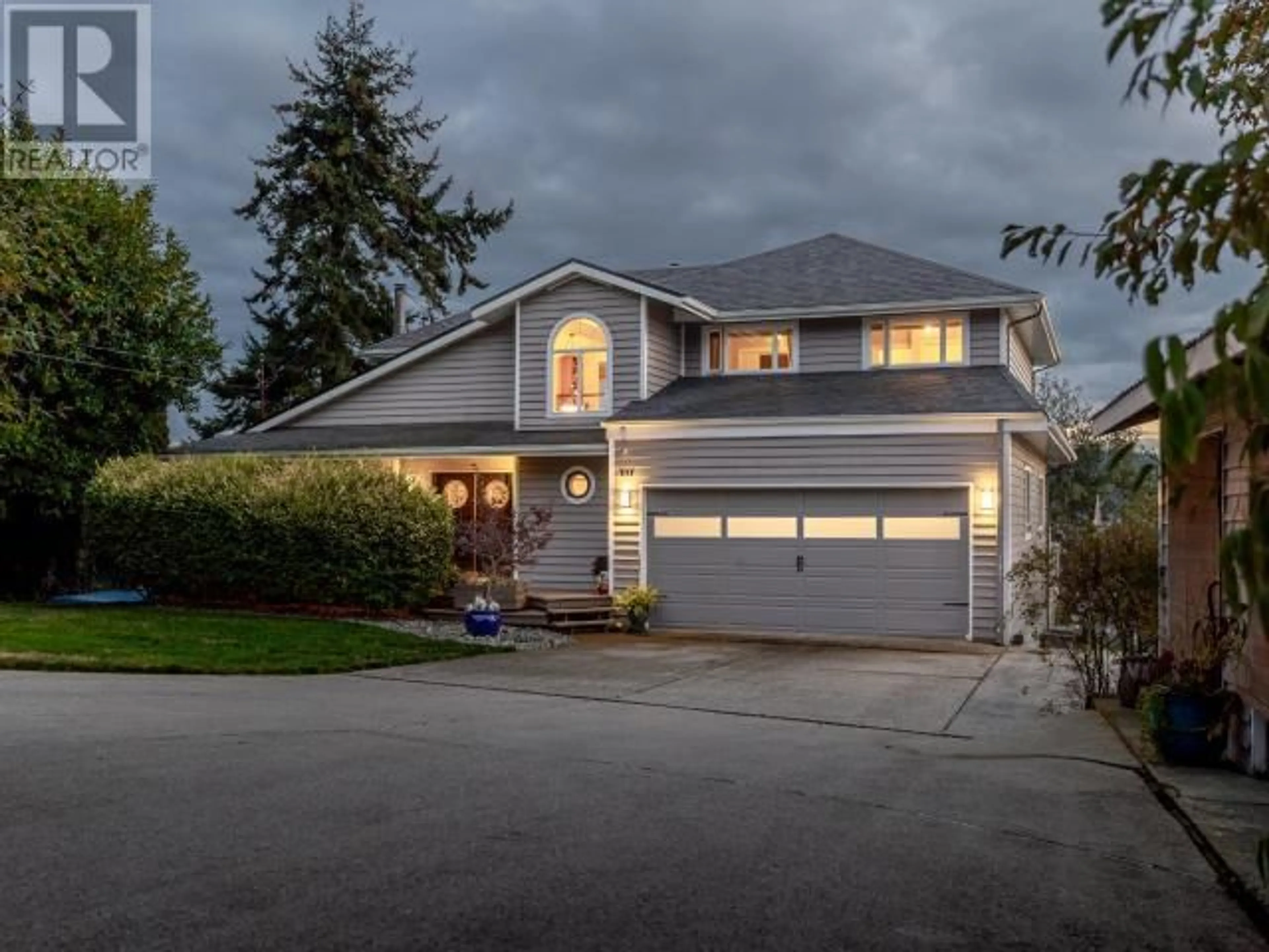 Home with vinyl exterior material, street for 8745 PATRICIA ROAD, Powell River British Columbia