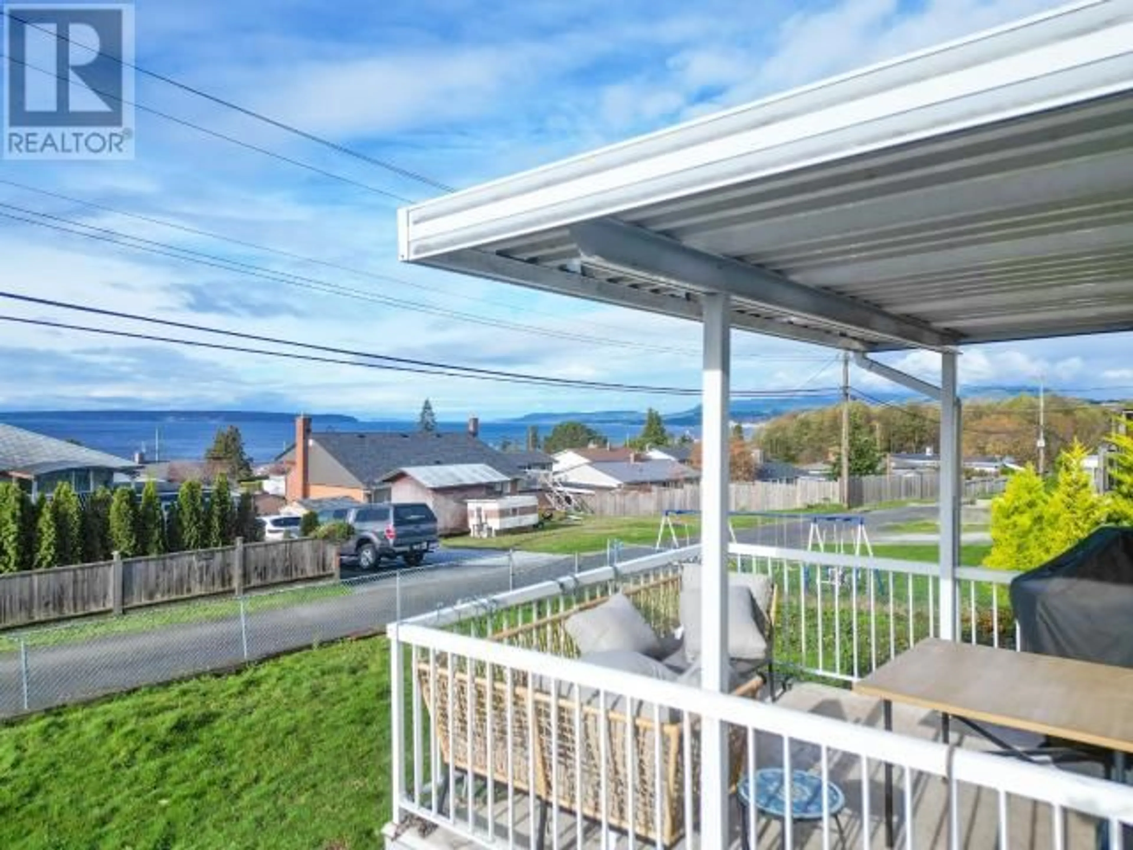 Patio, the fenced backyard for 4029 JOYCE AVE, Powell River British Columbia V8A2Z4