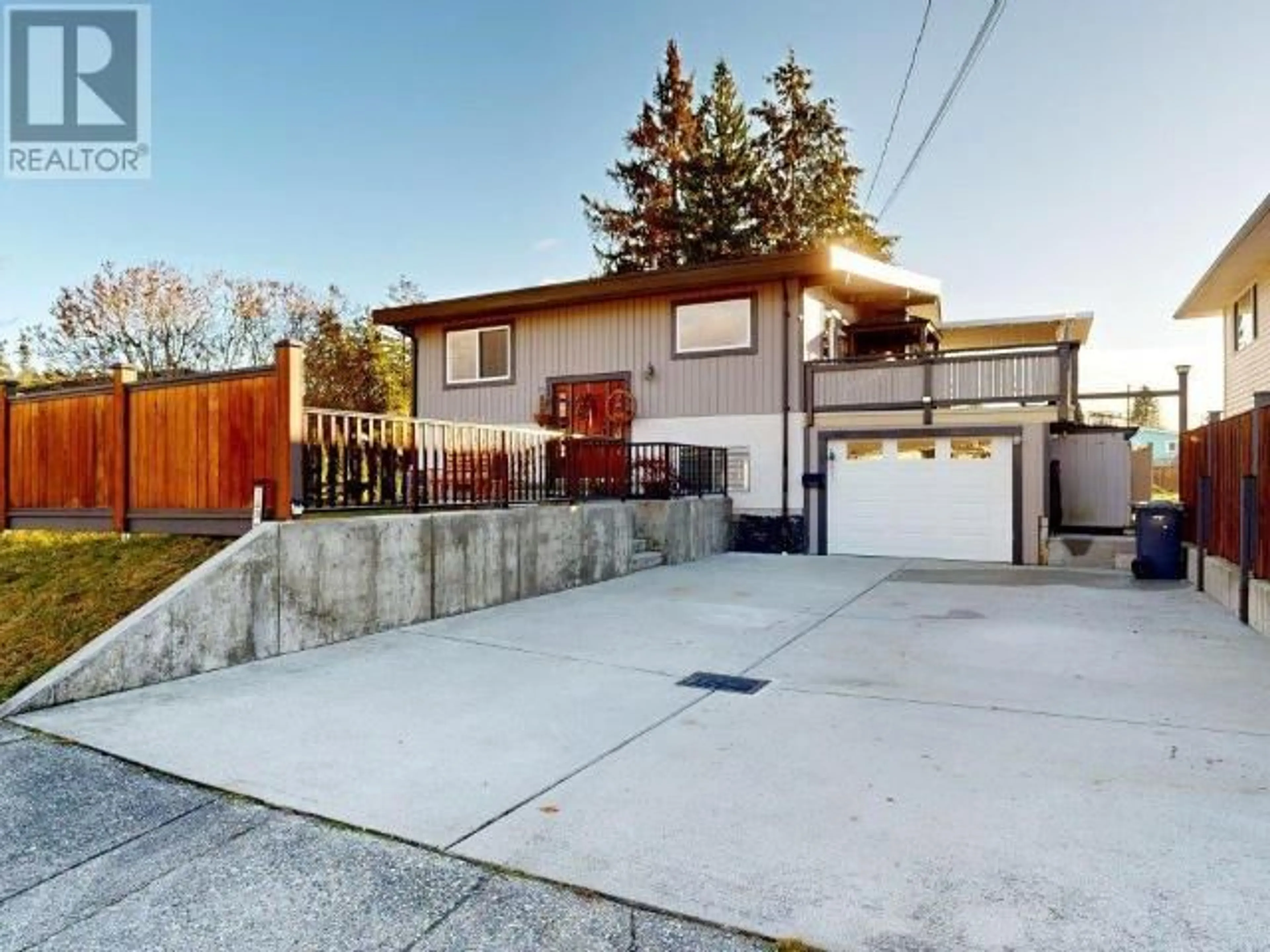 Frontside or backside of a home, the fenced backyard for 7236 GLACIER STREET, Powell River British Columbia