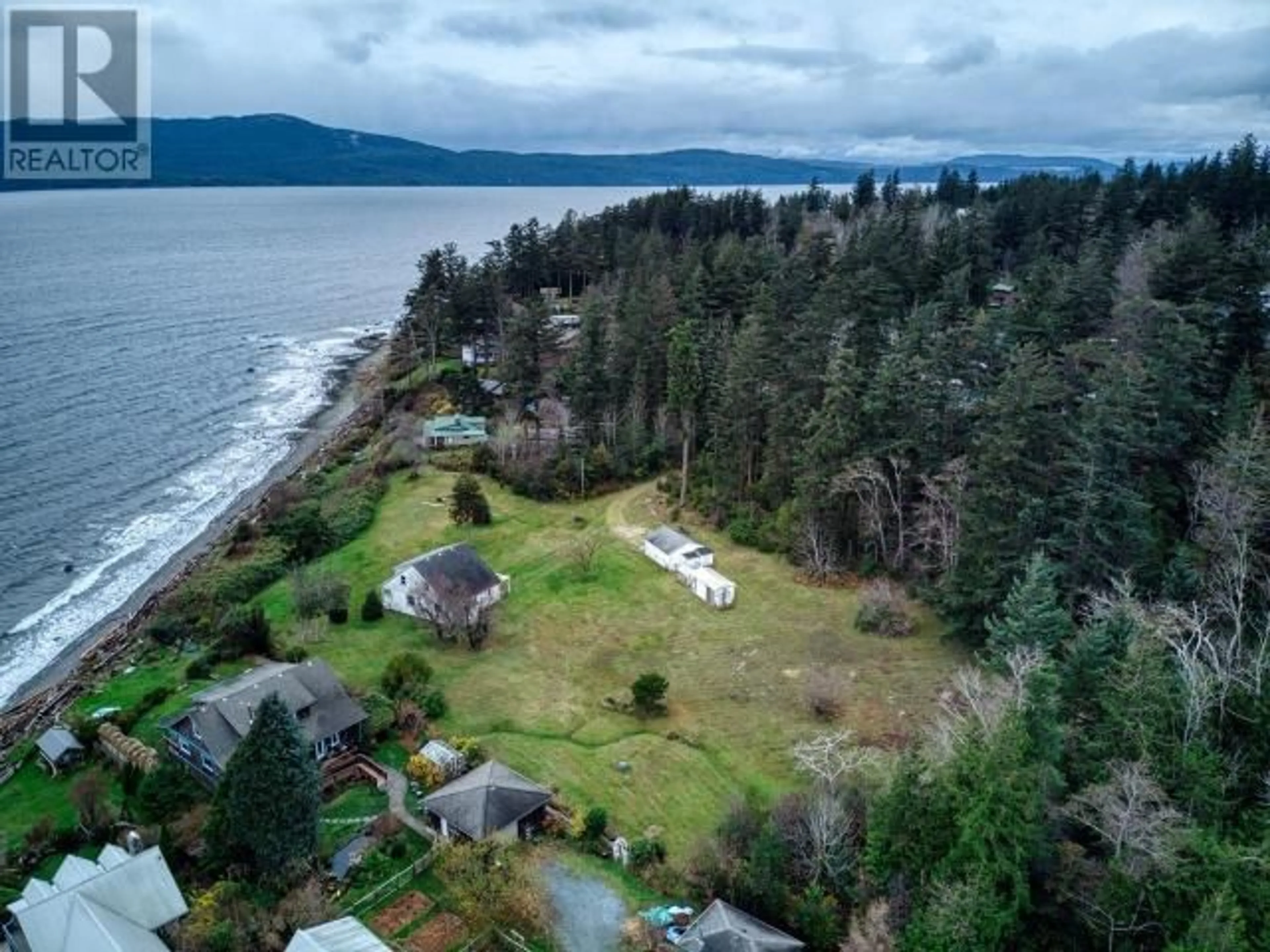 A pic from outside/outdoor area/front of a property/back of a property/a pic from drone, water/lake/river/ocean view for 2044 BROOM ROAD, Powell River British Columbia V8A5C1