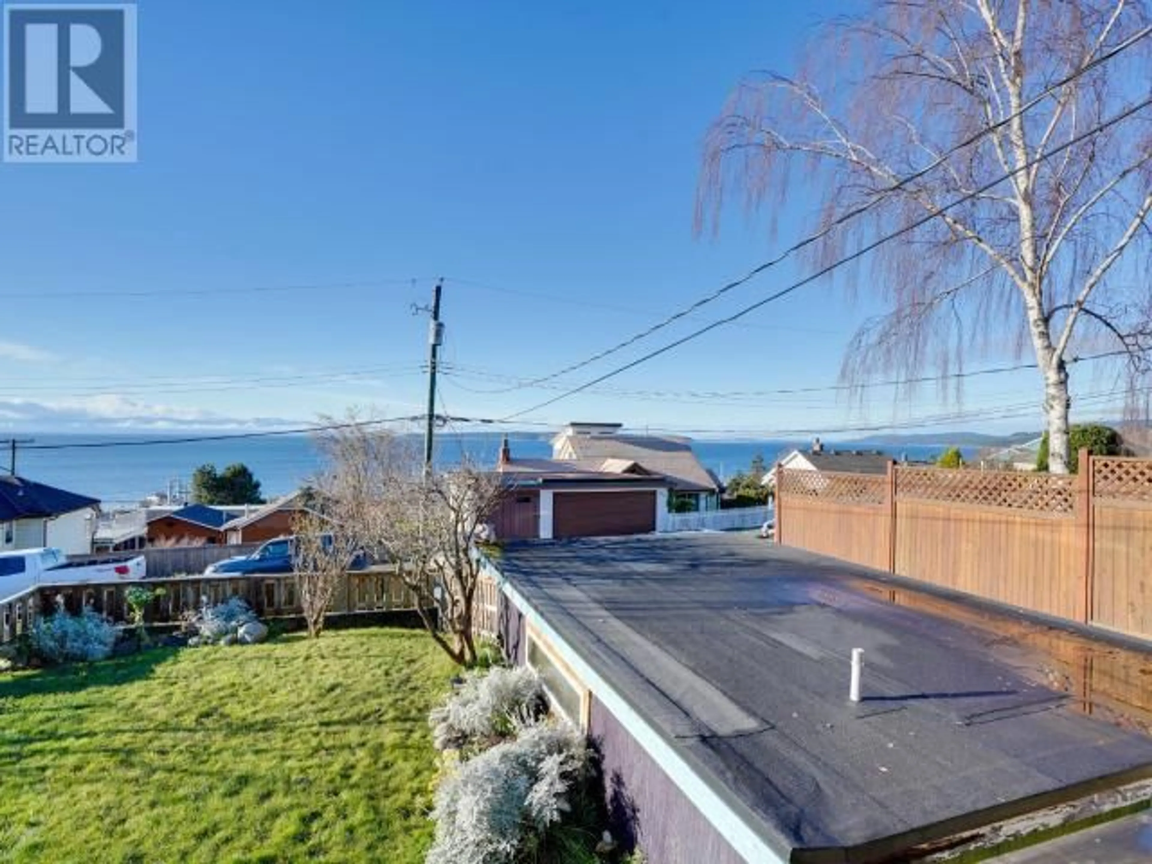 A pic from outside/outdoor area/front of a property/back of a property/a pic from drone, water/lake/river/ocean view for 4444 OMINECA AVE, Powell River British Columbia V8A2P7