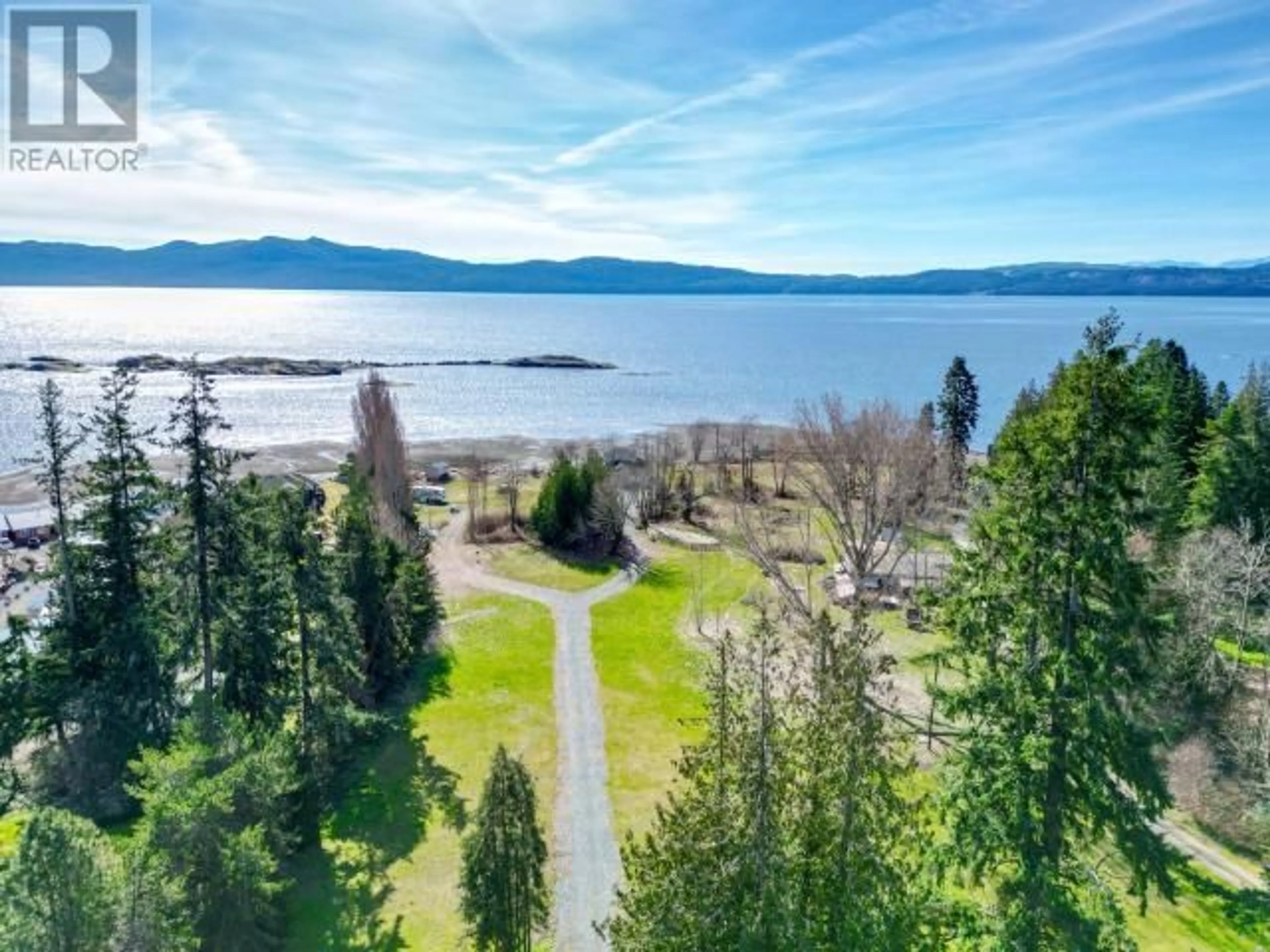 A pic from outside/outdoor area/front of a property/back of a property/a pic from drone, water/lake/river/ocean view for 8035 HIGHWAY 101, Powell River British Columbia V8A0S1