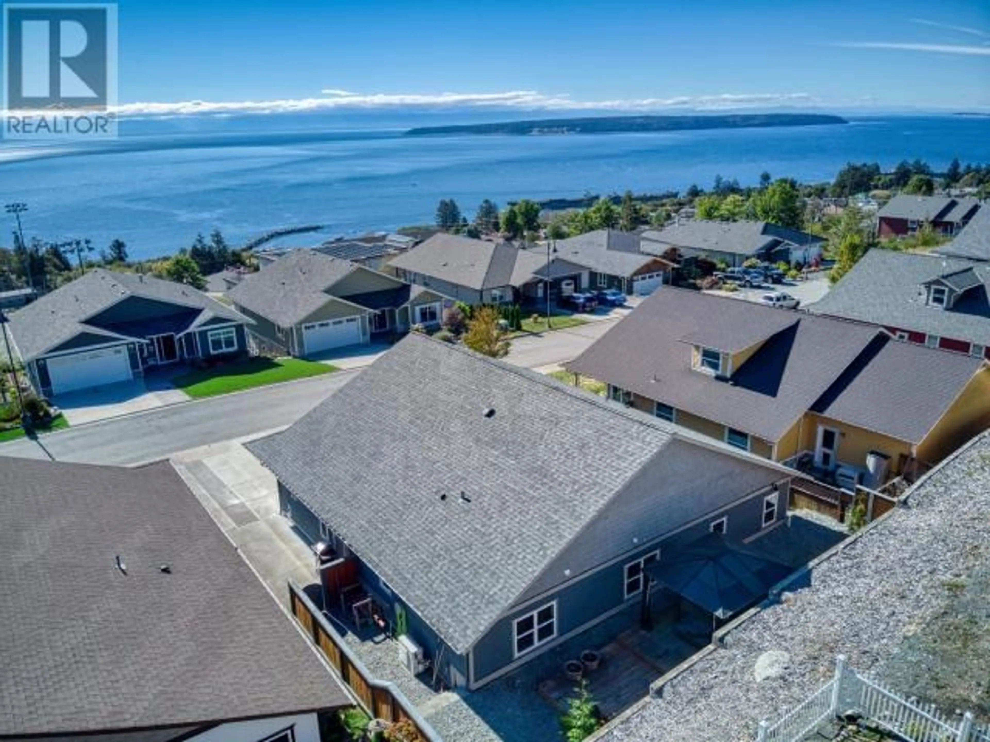 A pic from outside/outdoor area/front of a property/back of a property/a pic from drone, water/lake/river/ocean view for 5410 HEMLOCK STREET, Powell River British Columbia V8A0T6