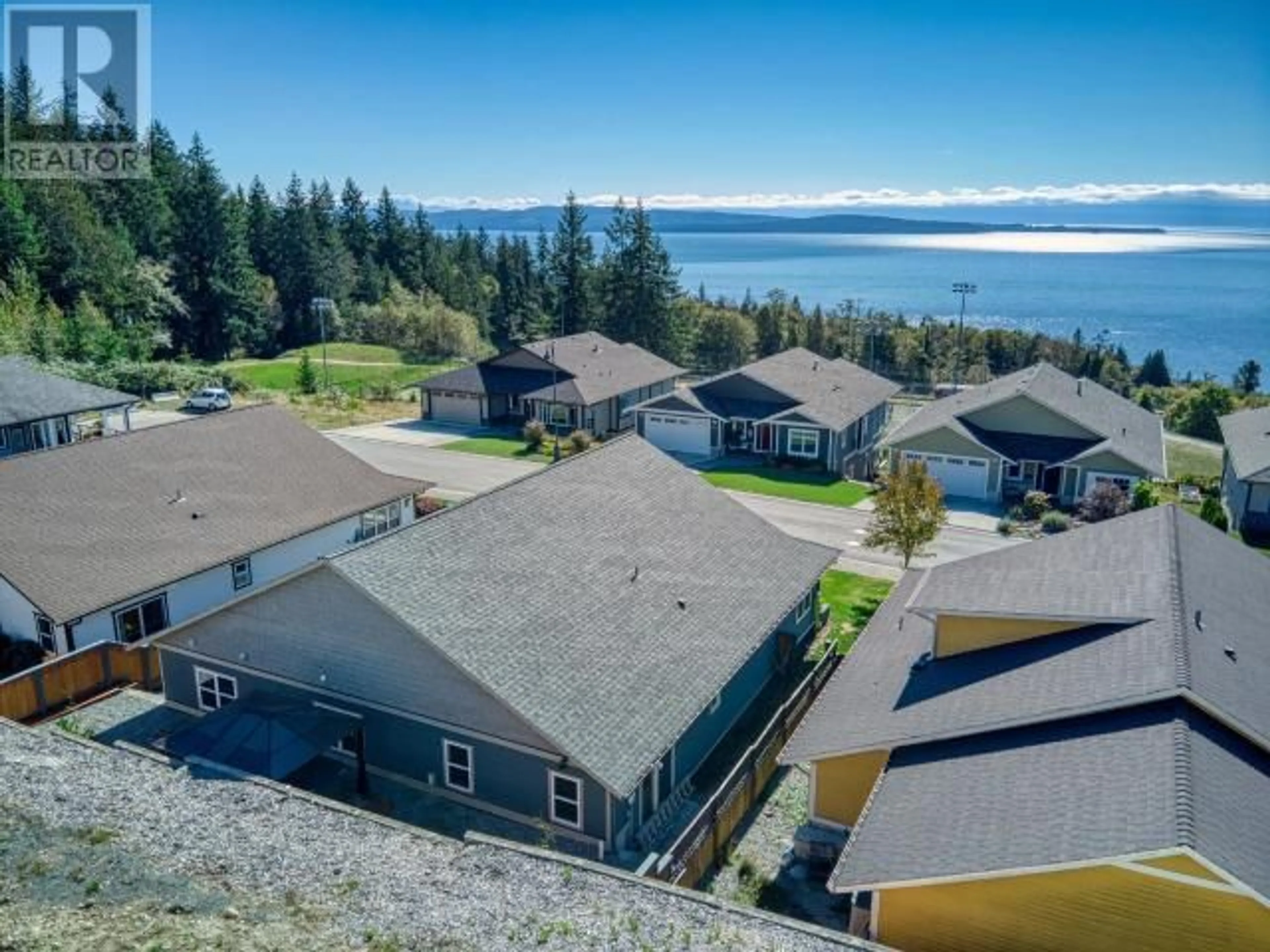 A pic from outside/outdoor area/front of a property/back of a property/a pic from drone, water/lake/river/ocean view for 5410 HEMLOCK STREET, Powell River British Columbia V8A0T6