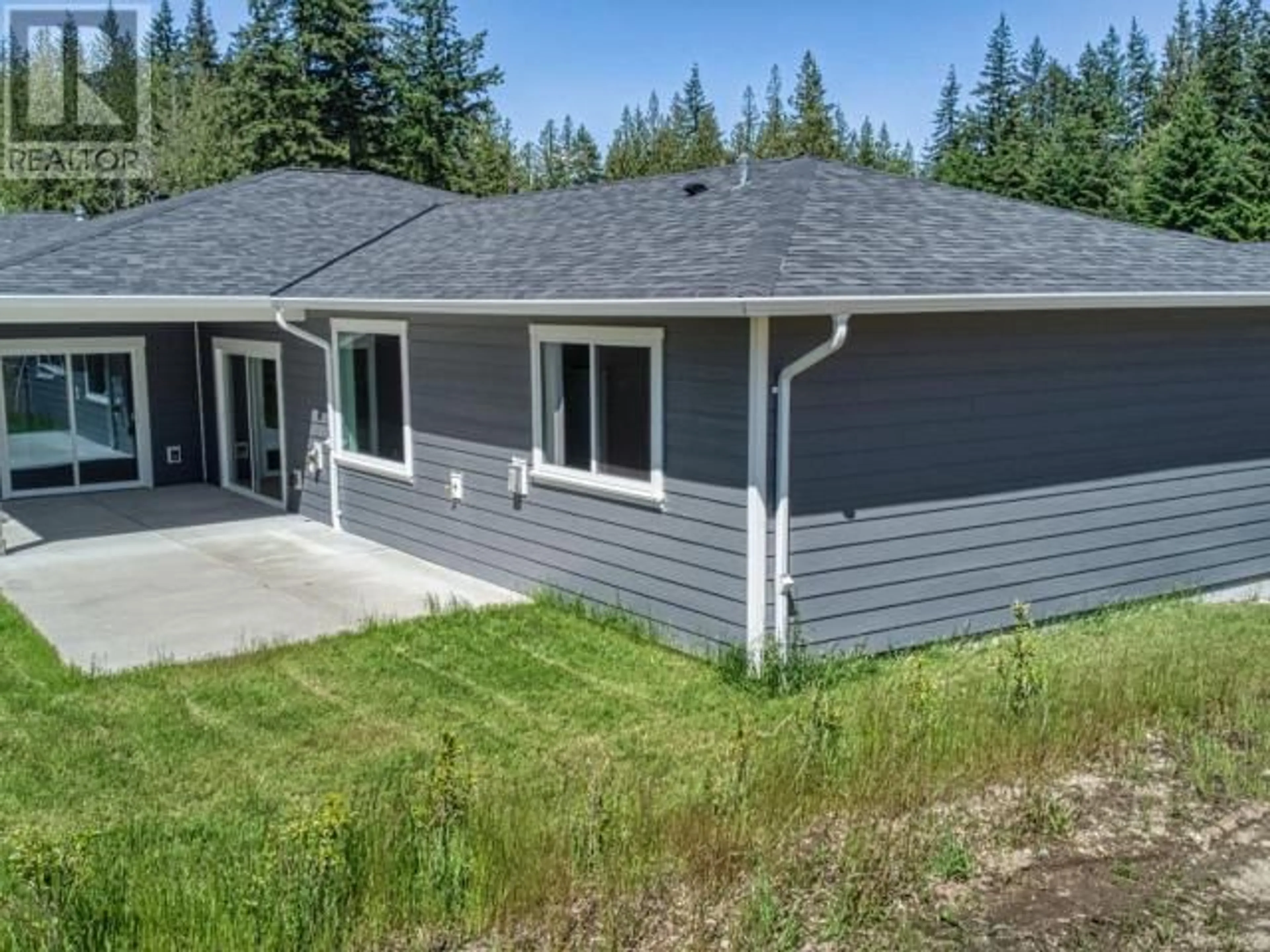 A pic from outside/outdoor area/front of a property/back of a property/a pic from drone, unknown for 210-7440 NOOTKA STREET, Powell River British Columbia