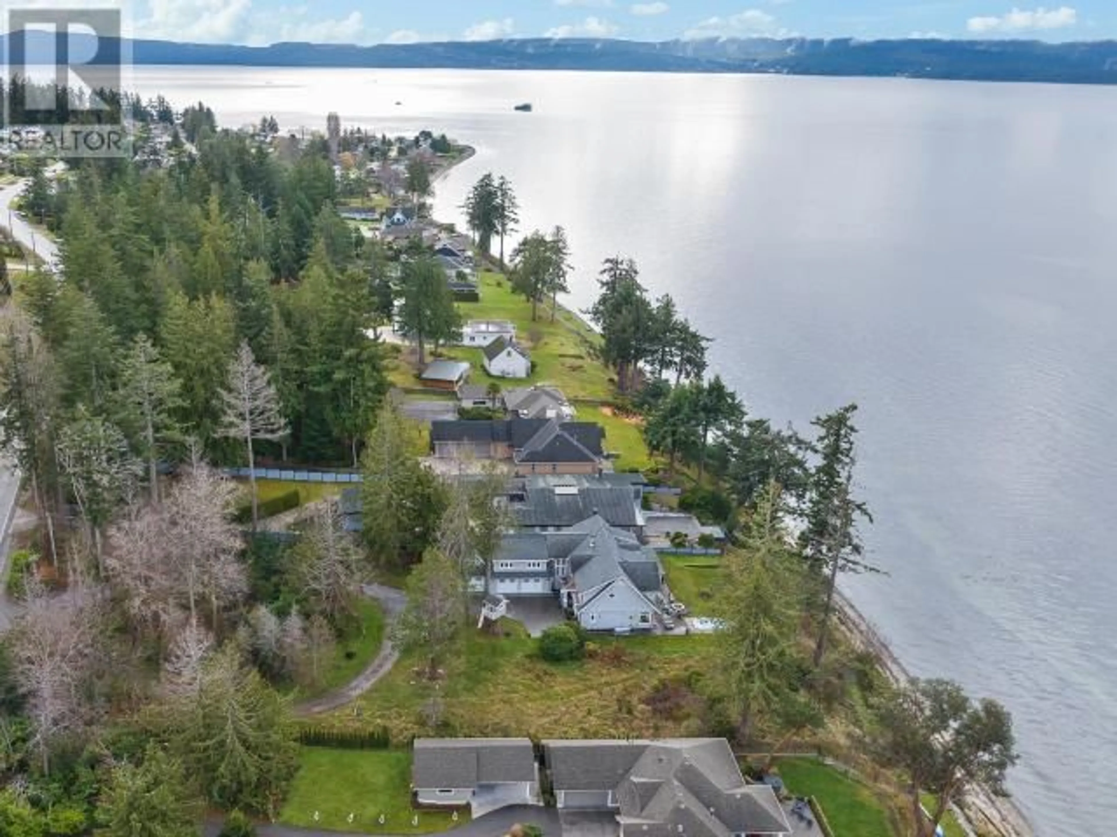 A pic from outside/outdoor area/front of a property/back of a property/a pic from drone, water/lake/river/ocean view for 3569 MARINE AVE, Powell River British Columbia V8A5K6