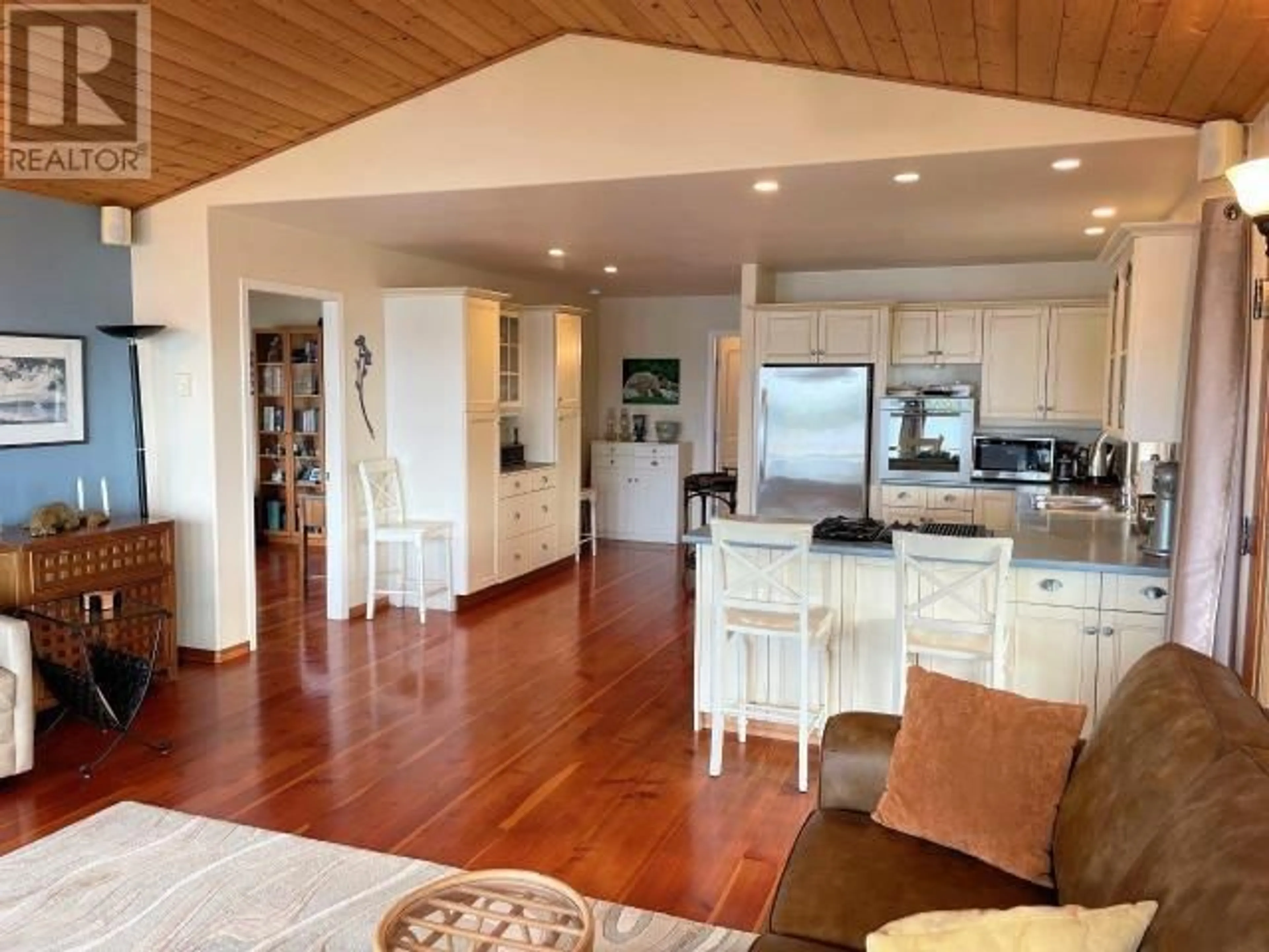 Open concept kitchen, wood/laminate floor for 10289 FINN BAY RD, Powell River British Columbia V0N2G0