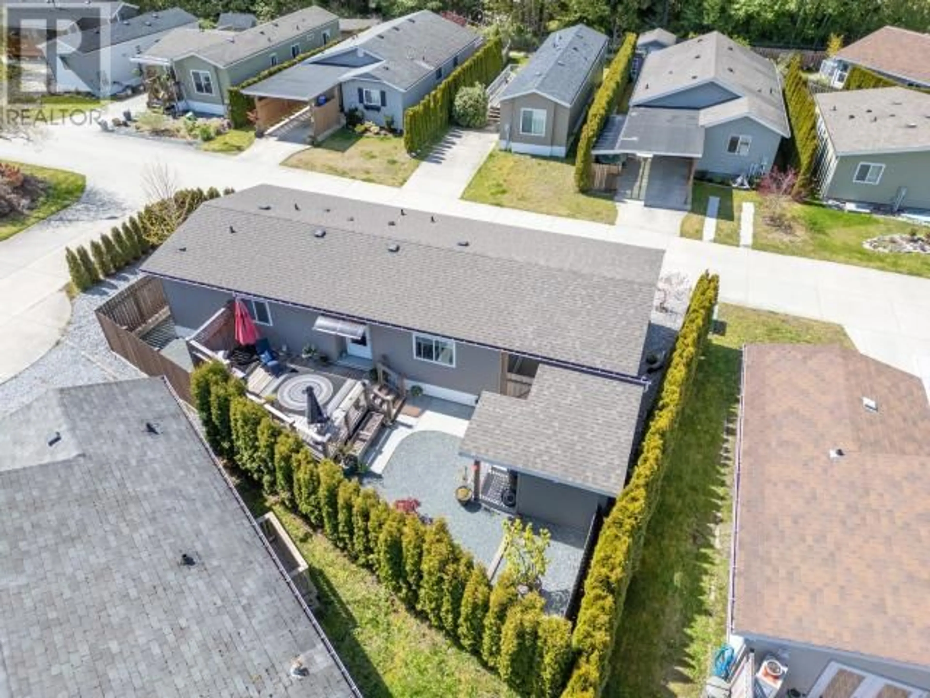 A pic from outside/outdoor area/front of a property/back of a property/a pic from drone, street for 115-8430 SPRINGBROOK ROAD, Powell River British Columbia V8A0S3