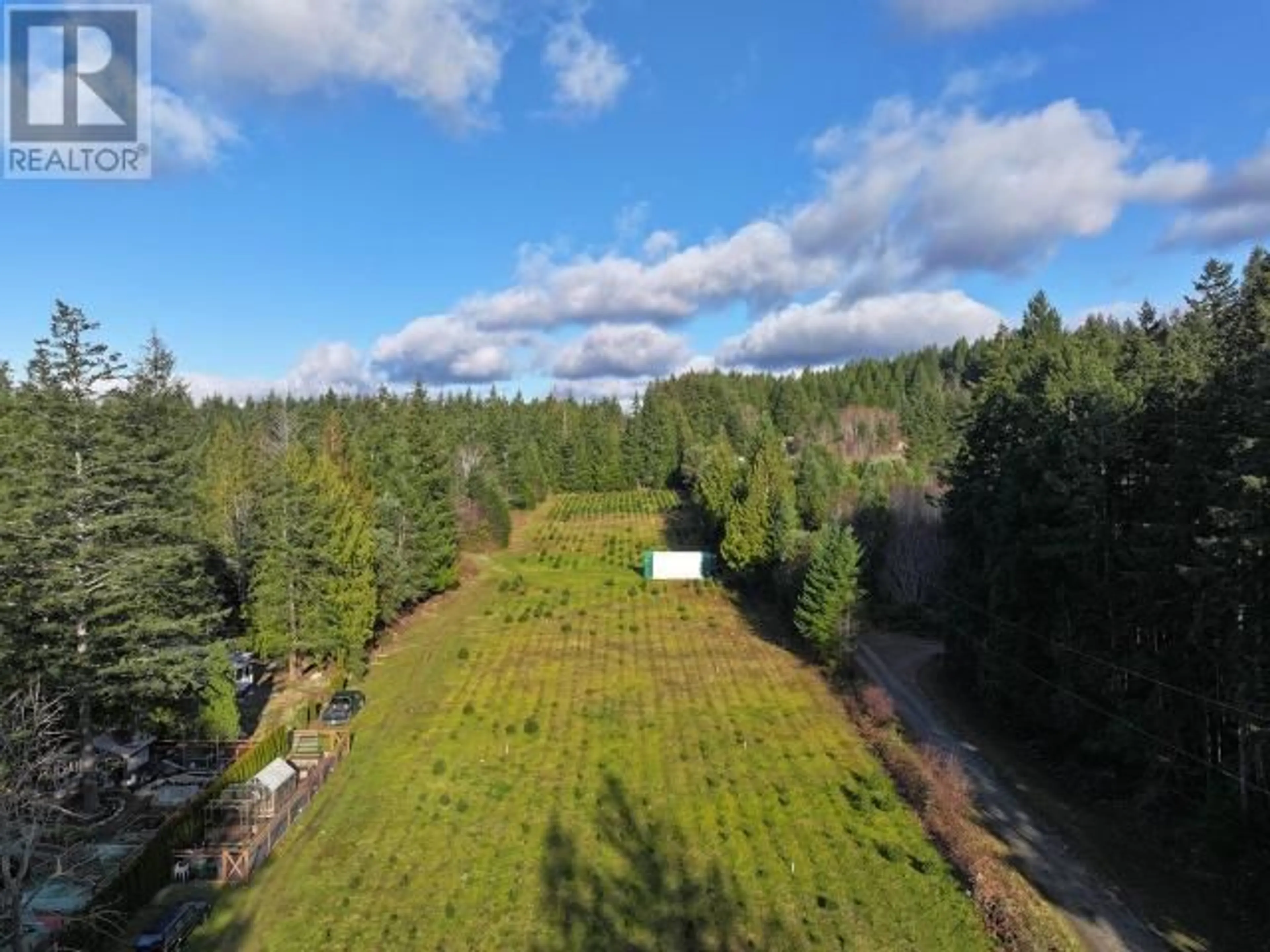 A pic from outside/outdoor area/front of a property/back of a property/a pic from drone, forest/trees view for 7251 THUNDER BAY STREET, Powell River British Columbia