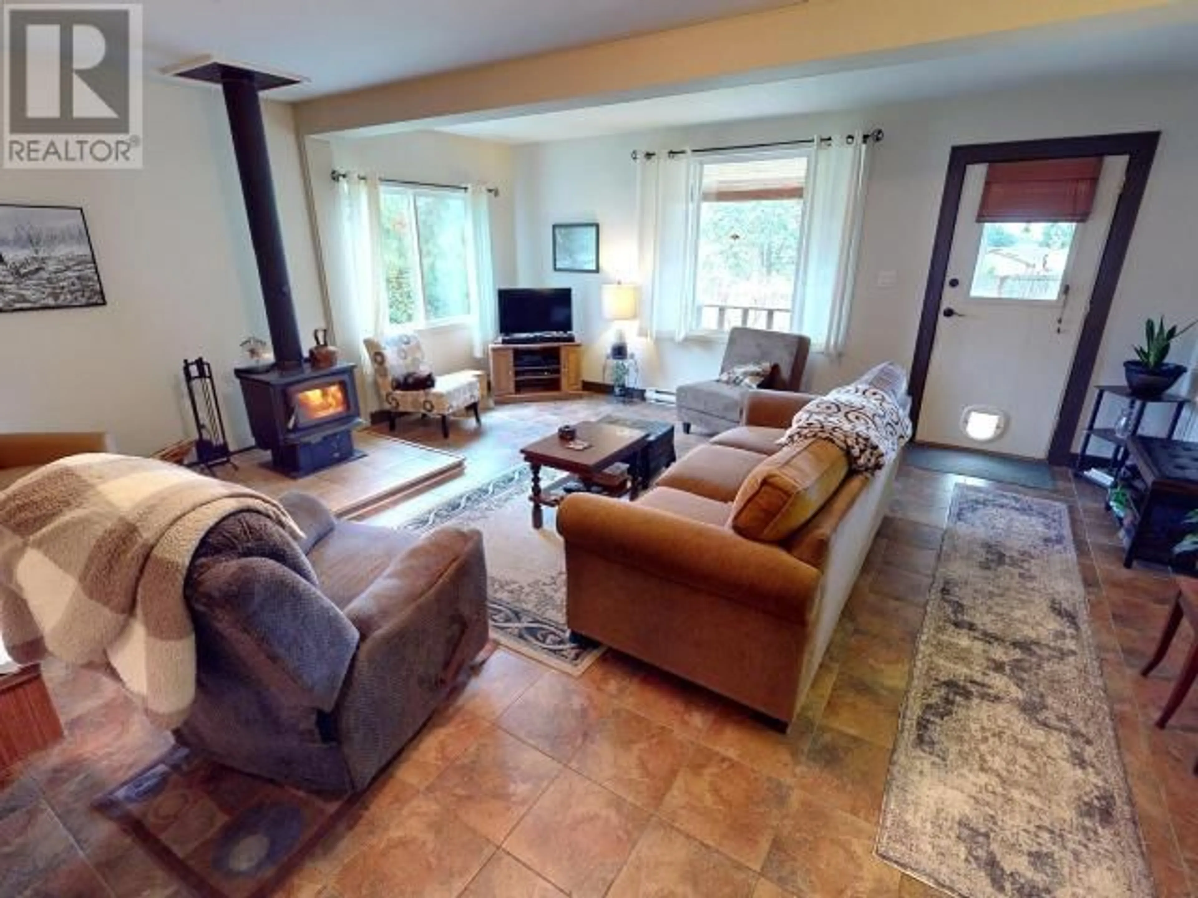 Living room with furniture, ceramic/tile floor for 4567 ALDER AVE, Texada Island British Columbia V0N1W0