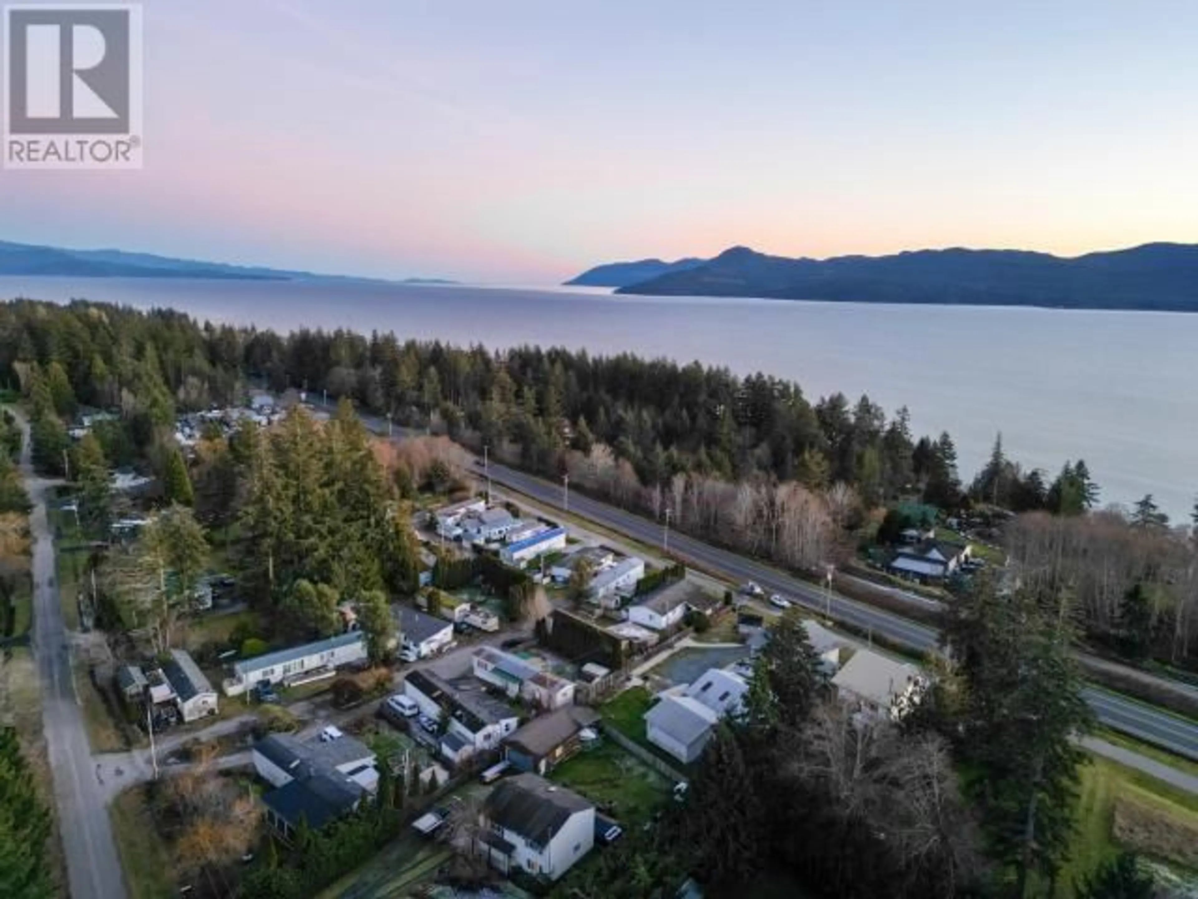 A pic from outside/outdoor area/front of a property/back of a property/a pic from drone, water/lake/river/ocean view for 7-9298 WILLIAMS RD, Powell River British Columbia