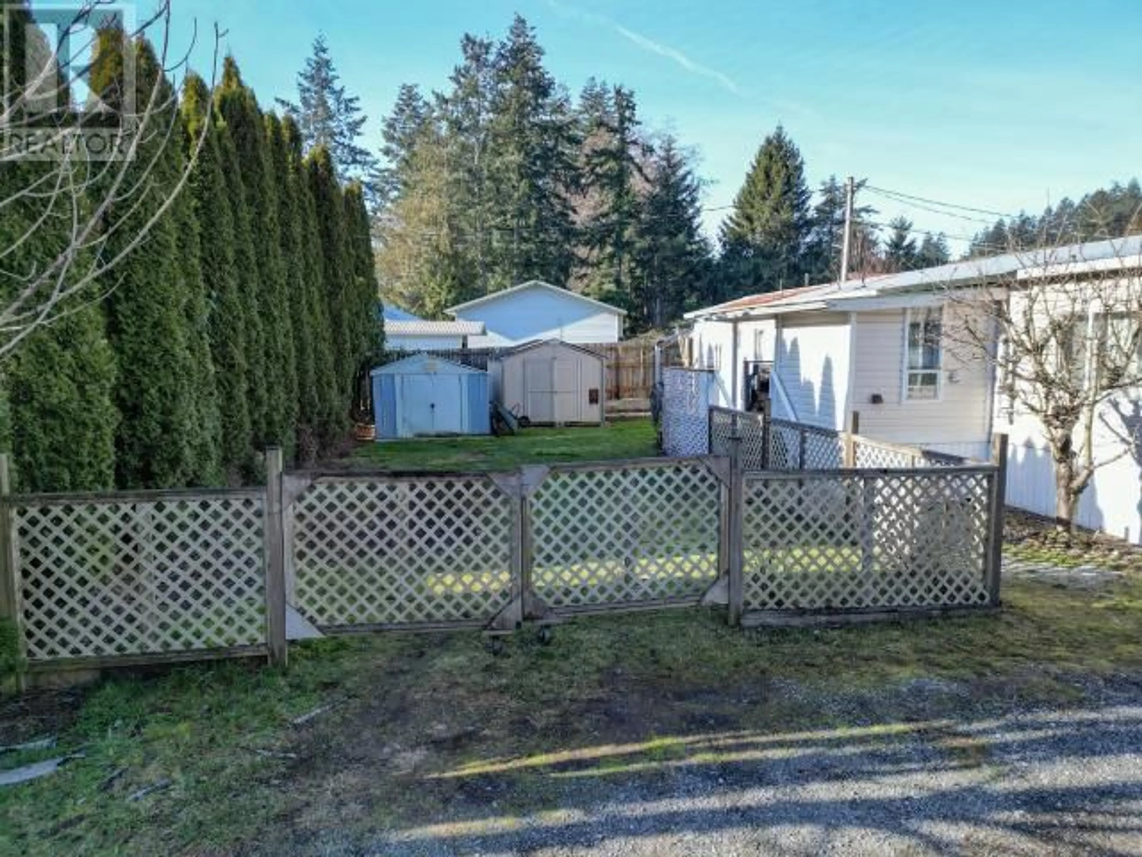 A pic from outside/outdoor area/front of a property/back of a property/a pic from drone, street for 7-9298 WILLIAMS RD, Powell River British Columbia