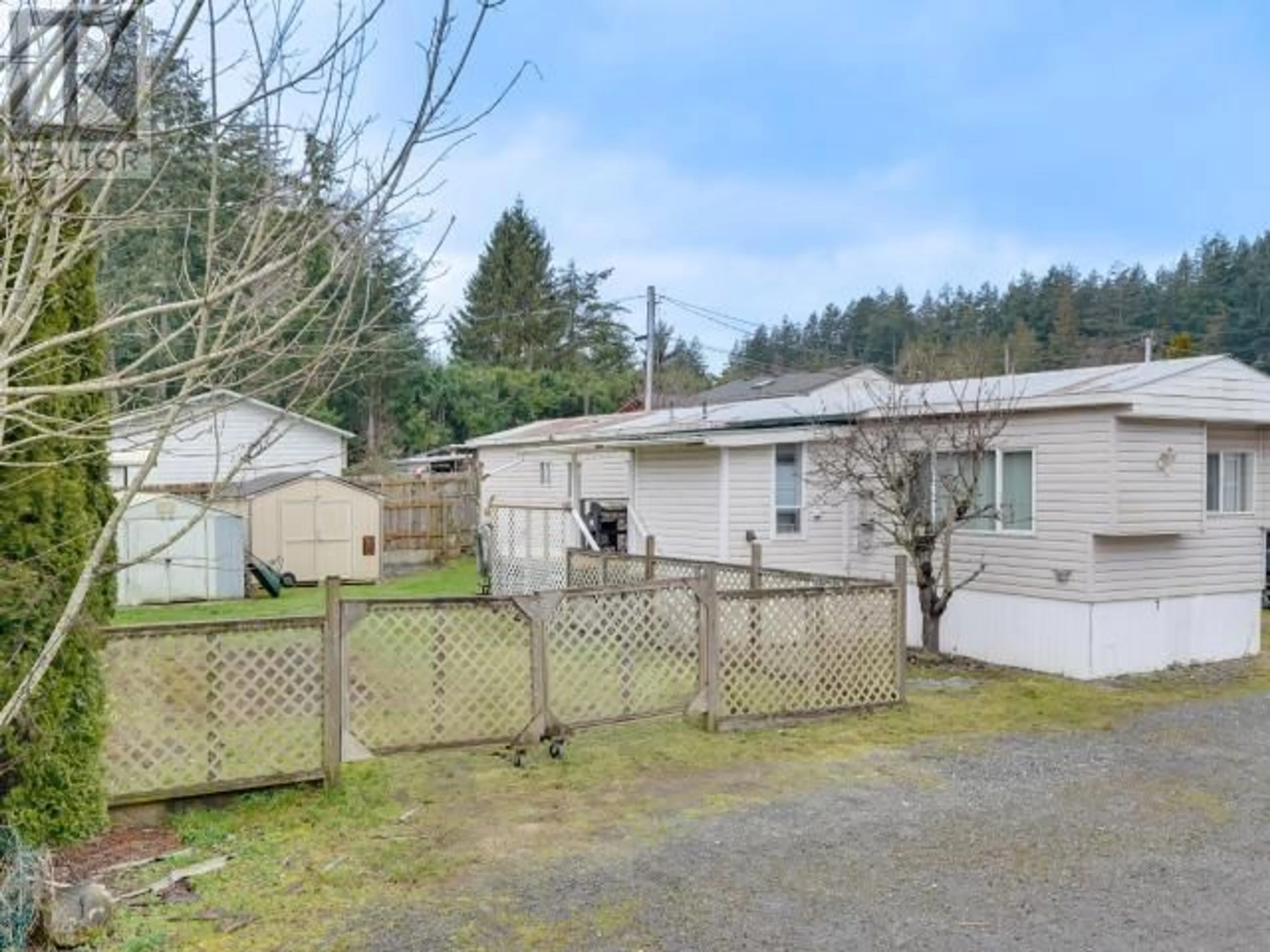 A pic from outside/outdoor area/front of a property/back of a property/a pic from drone, street for 7-9298 WILLIAMS RD, Powell River British Columbia