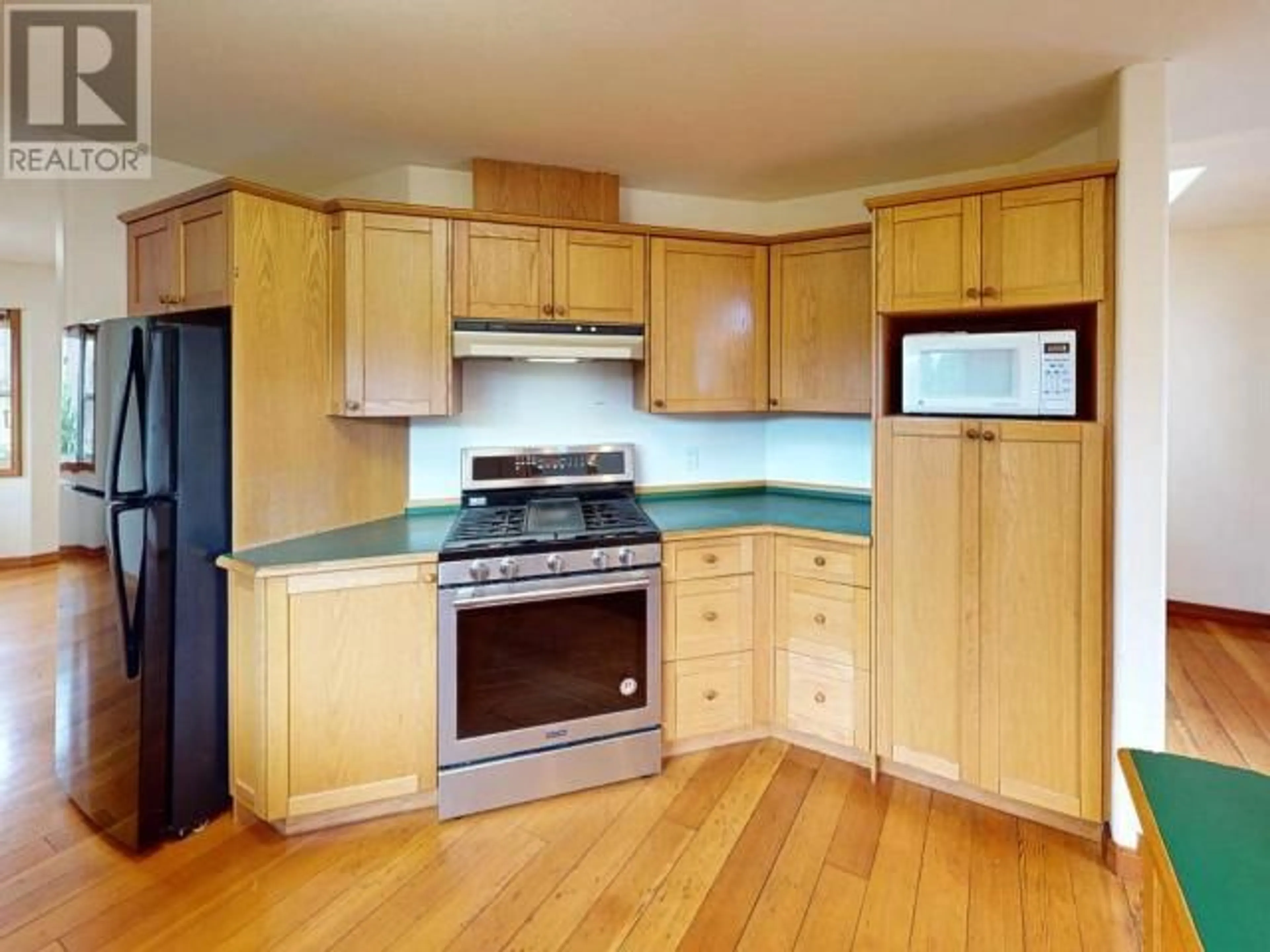 Standard kitchen, wood/laminate floor for 5877 SKEENA STREET, Powell River British Columbia