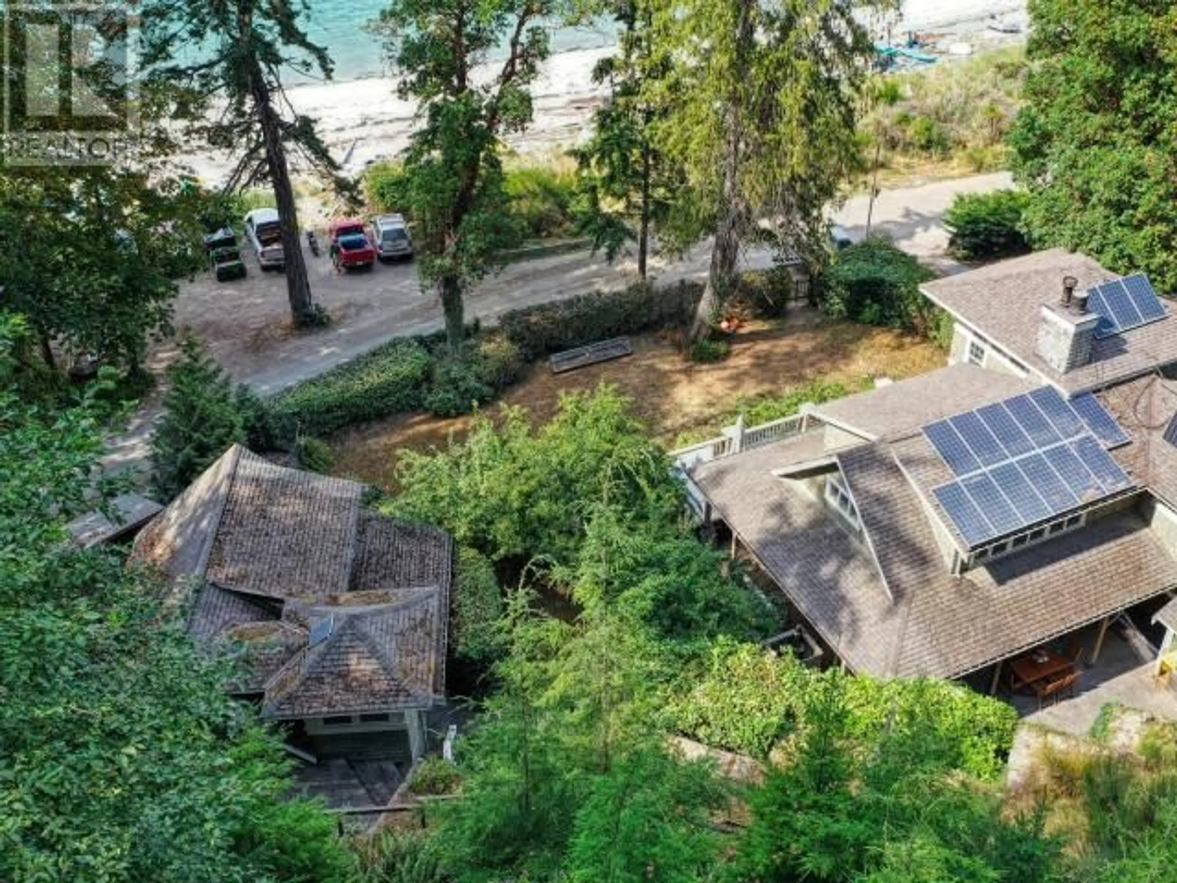 A pic from outside/outdoor area/front of a property/back of a property/a pic from drone, water/lake/river/ocean view for 2916/20 MALASPINA PROMENADE, Savary Island British Columbia