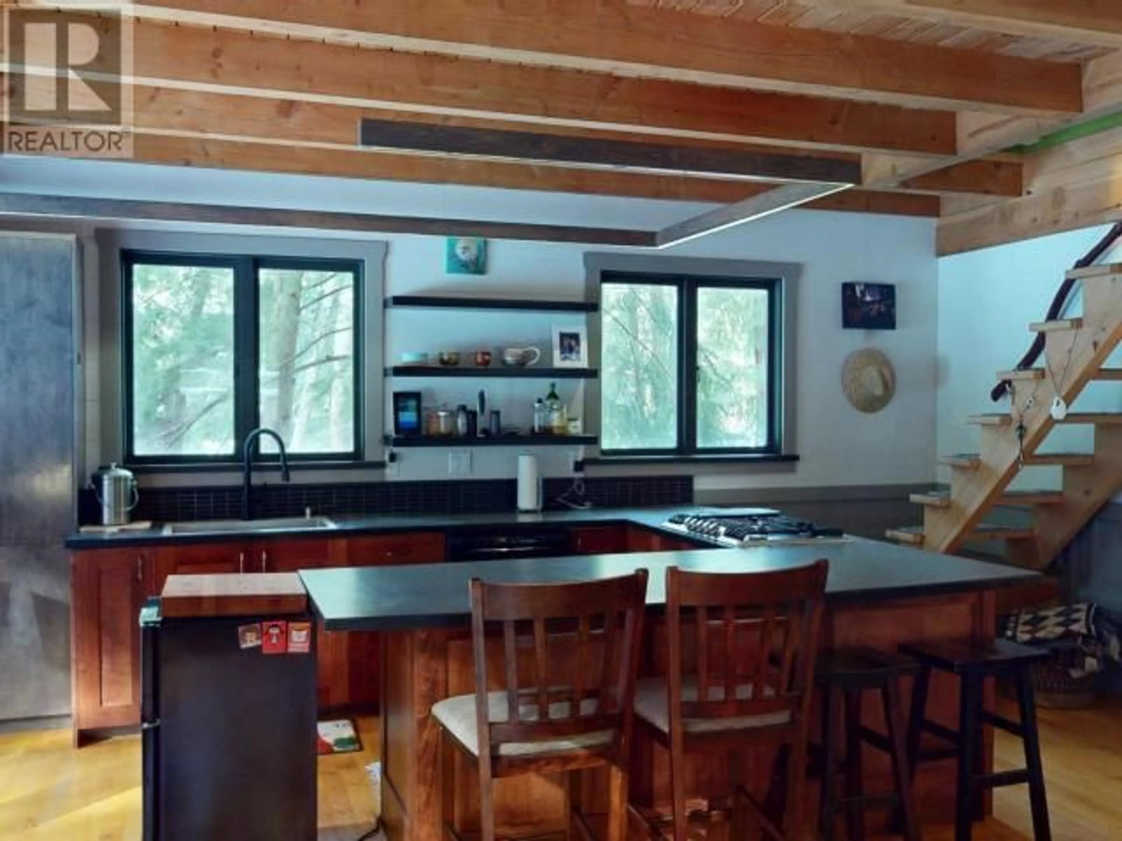 Open concept kitchen, wood/laminate floor for 1223 VANCOUVER BLVD, Savary Island British Columbia