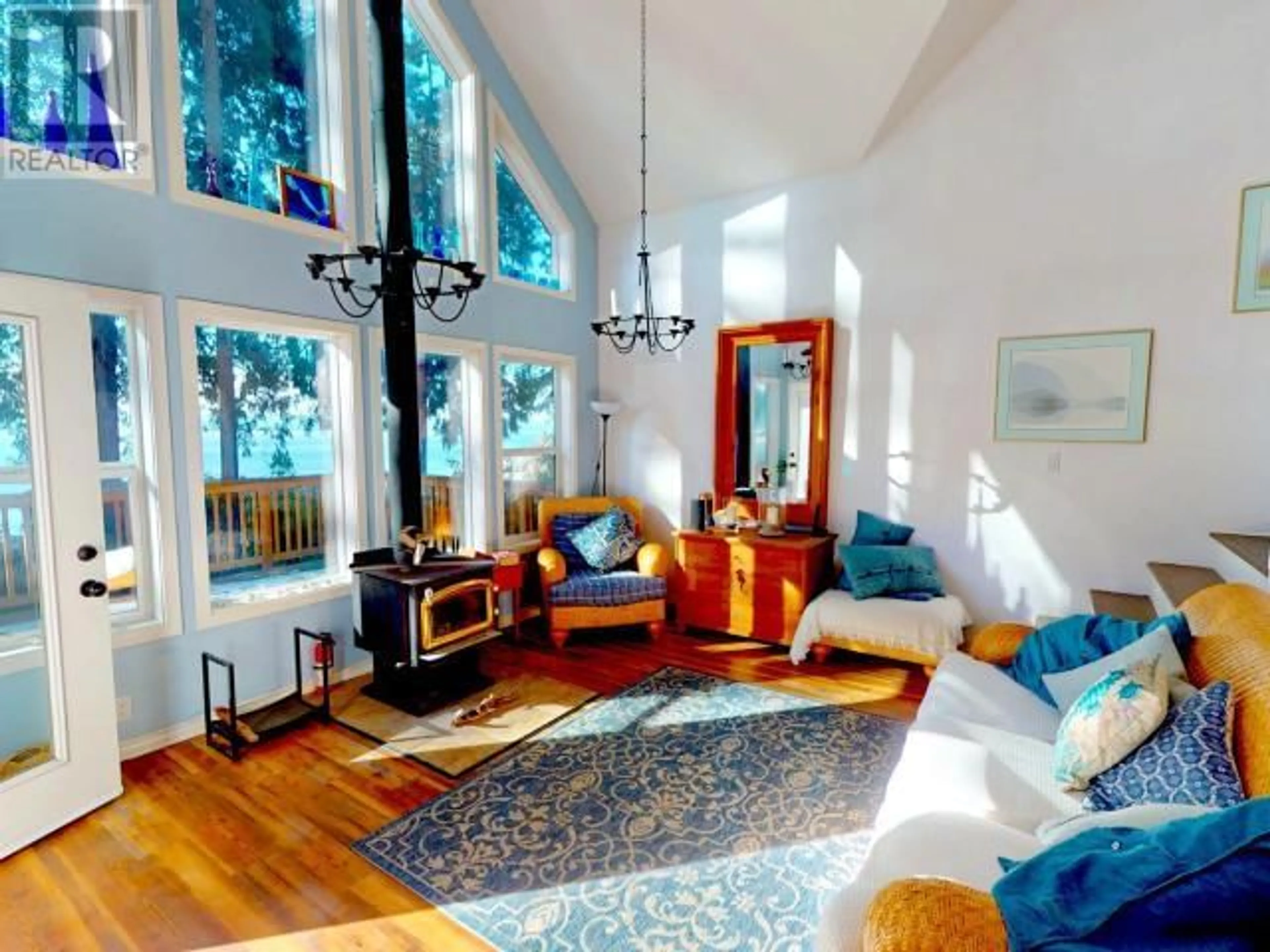 Living room with furniture, wood/laminate floor for 2902 ARBUTUS LANE, Savary Island British Columbia V0N2G0