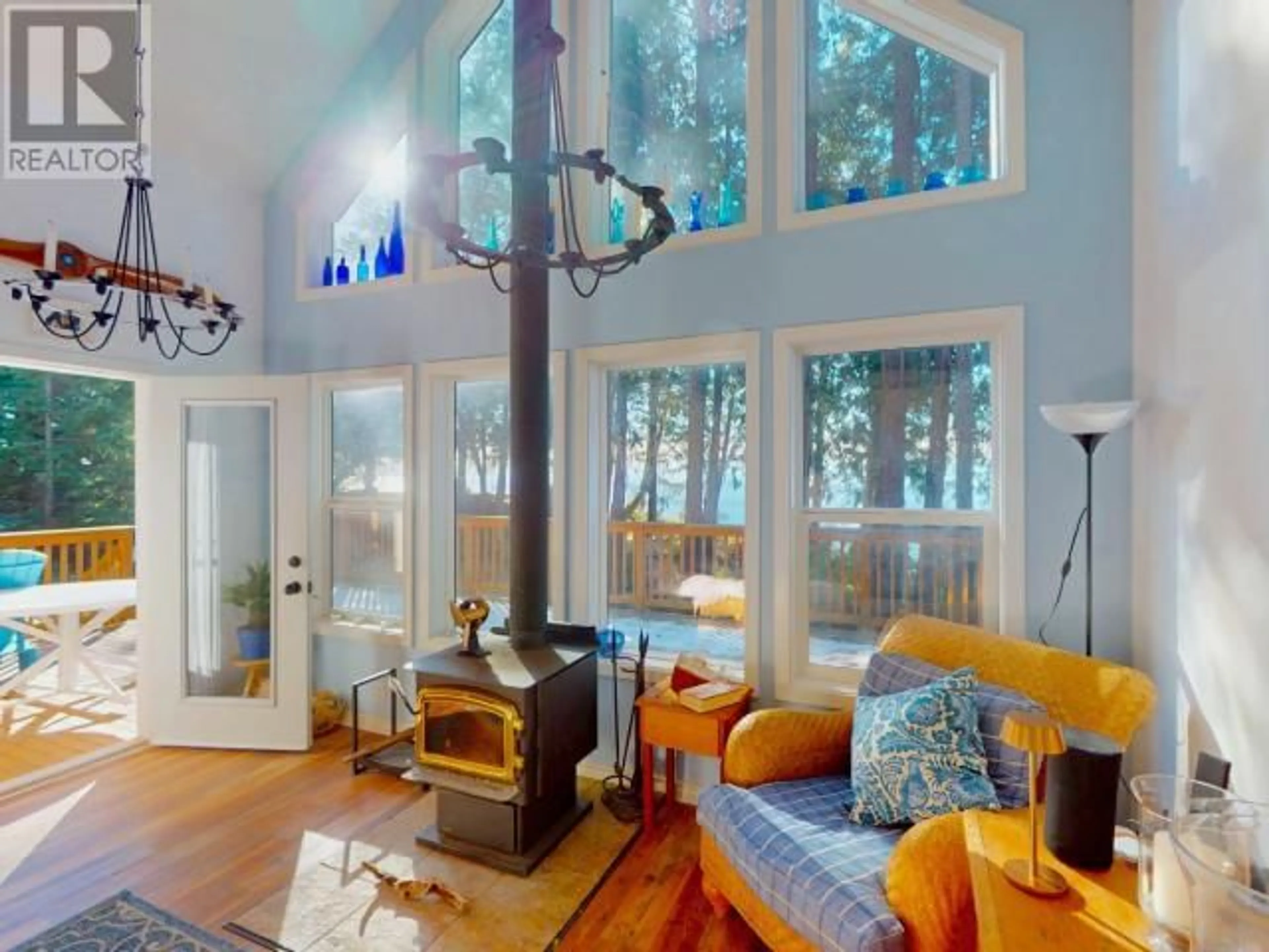 Living room with furniture, wood/laminate floor for 2902 ARBUTUS LANE, Savary Island British Columbia V0N2G0