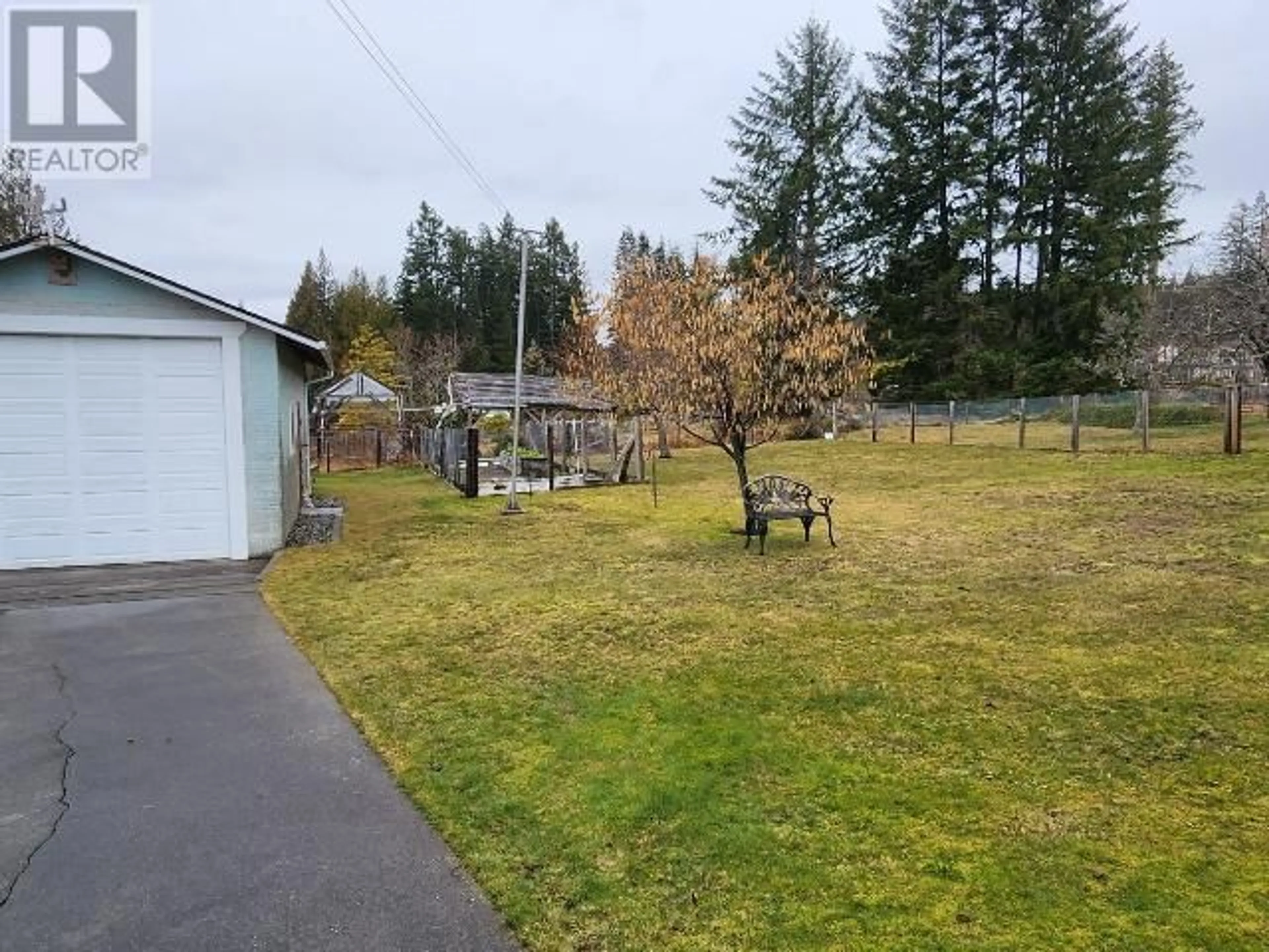 A pic from outside/outdoor area/front of a property/back of a property/a pic from drone, forest/trees view for 7029 QUESNEL STREET, Powell River British Columbia V8A1J5