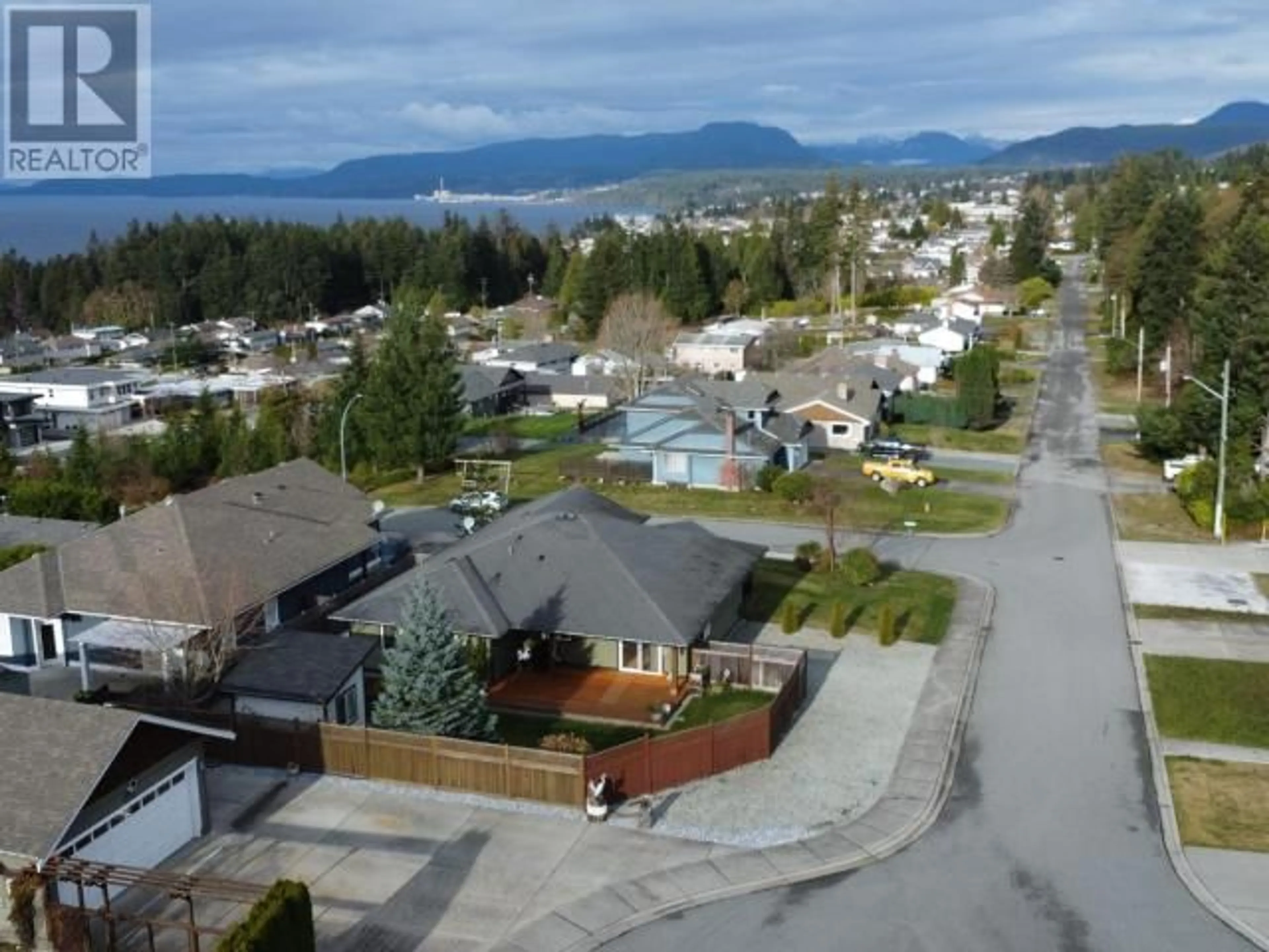 A pic from outside/outdoor area/front of a property/back of a property/a pic from drone, mountain view for 7068 ROYSTON STREET, Powell River British Columbia V8A0A2