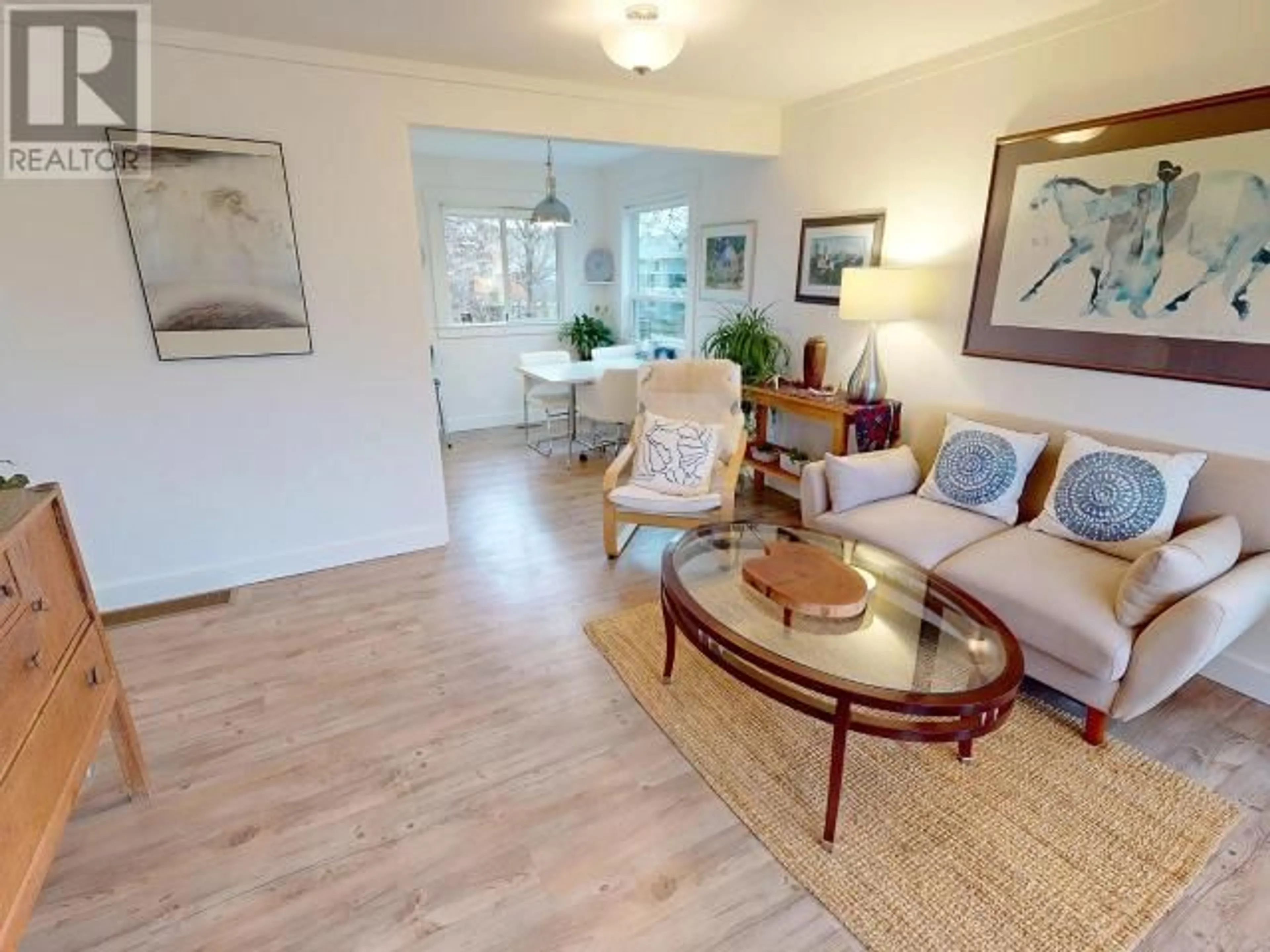 Living room with furniture, wood/laminate floor for 6858 GERRARD STREET, Powell River British Columbia